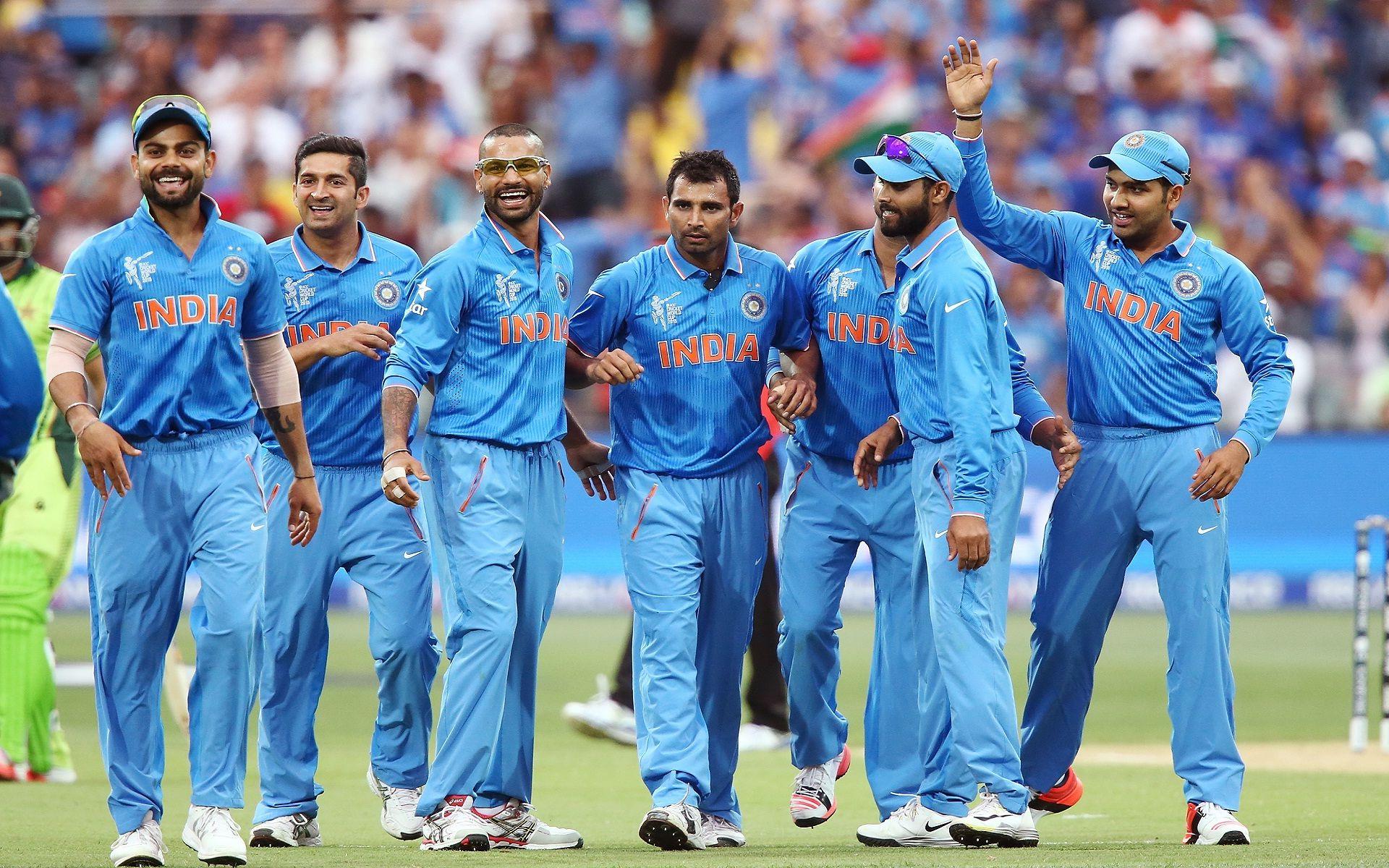 Happy indian cricket team on the ground nice wallpaper