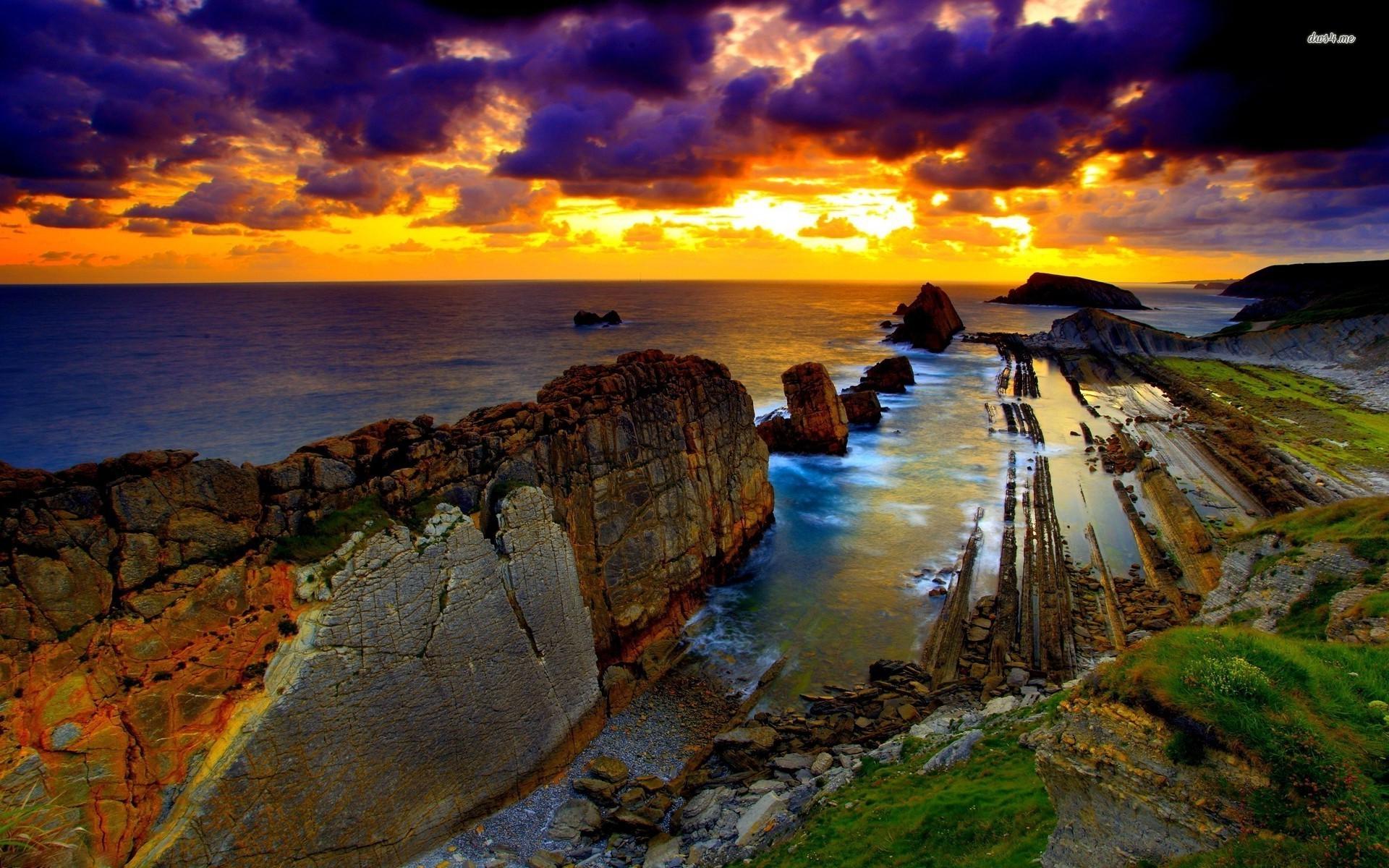 Sunset over the rocky coast wallpaper wallpaper
