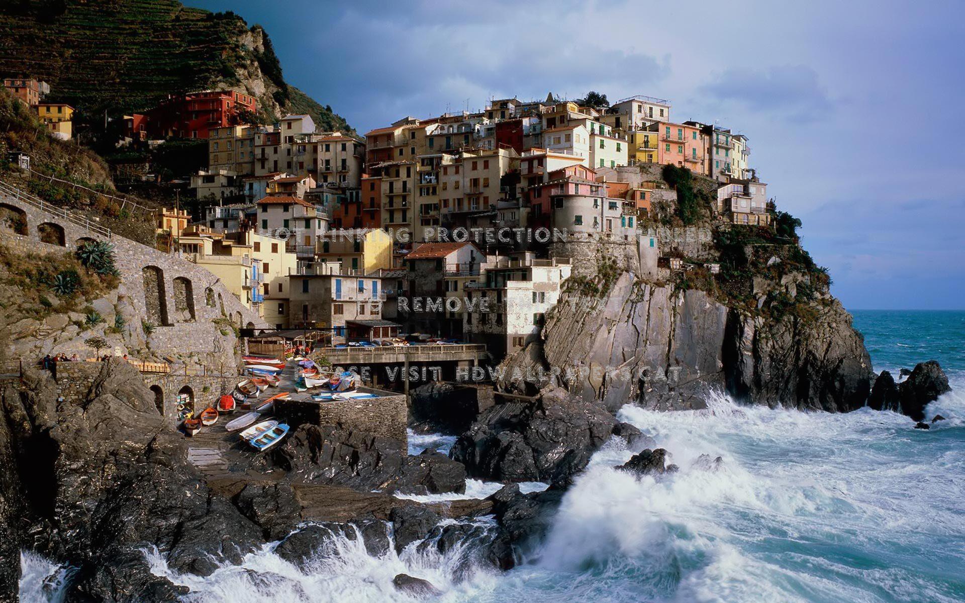 manarola italy rocky coast background