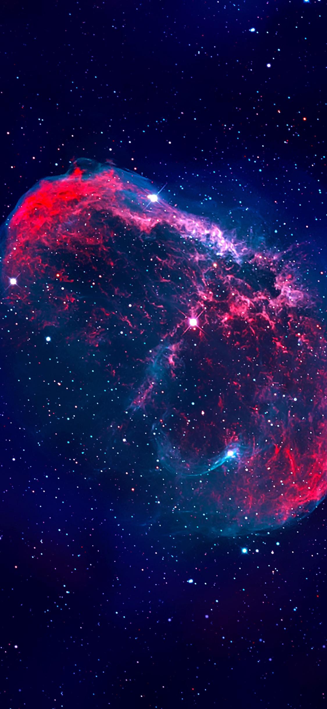 Download wallpaper: The Crescent nebula 1125x2436