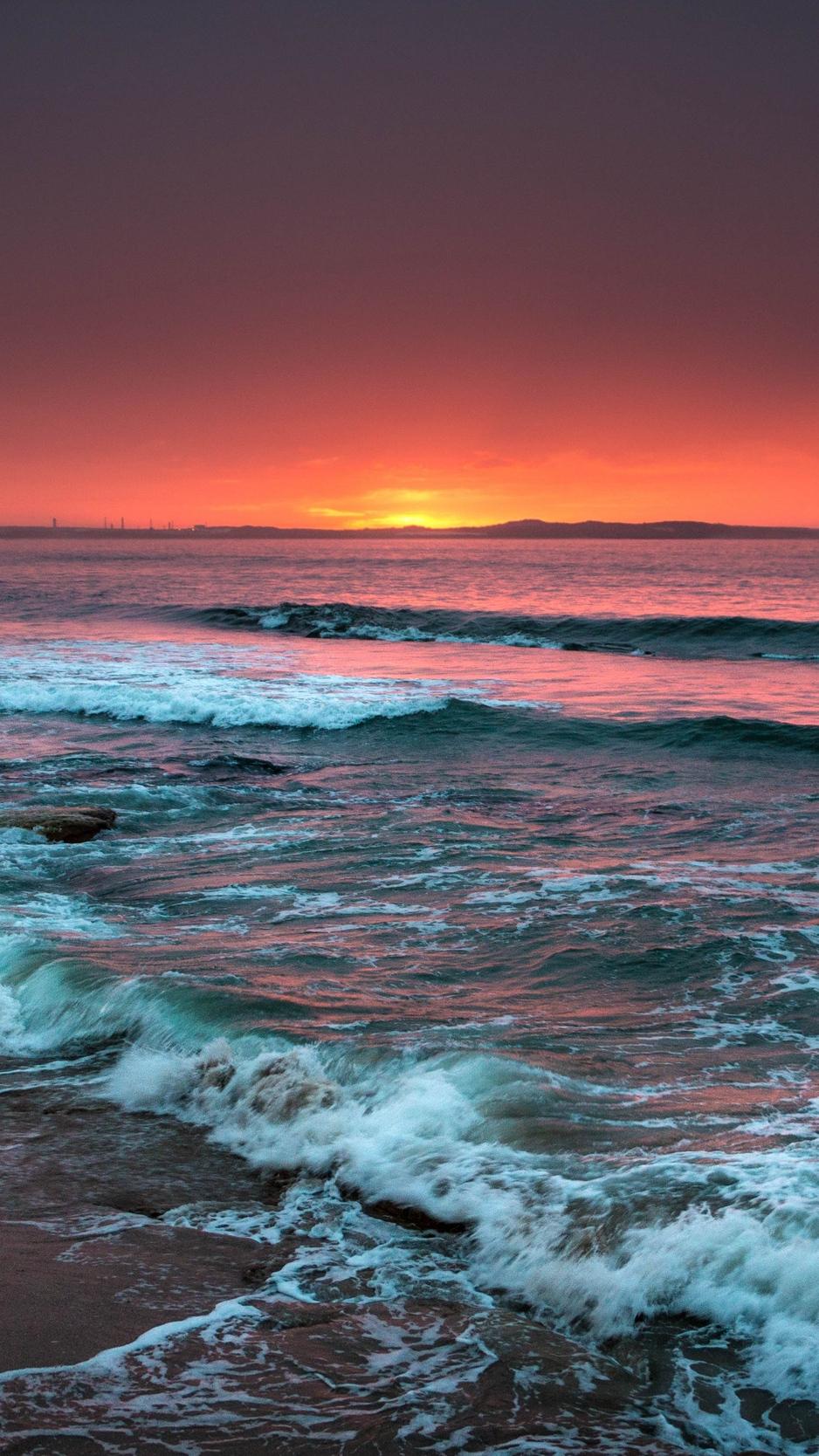 Download wallpaper 938x1668 sea, horizon, sunset, waves, foam, surf