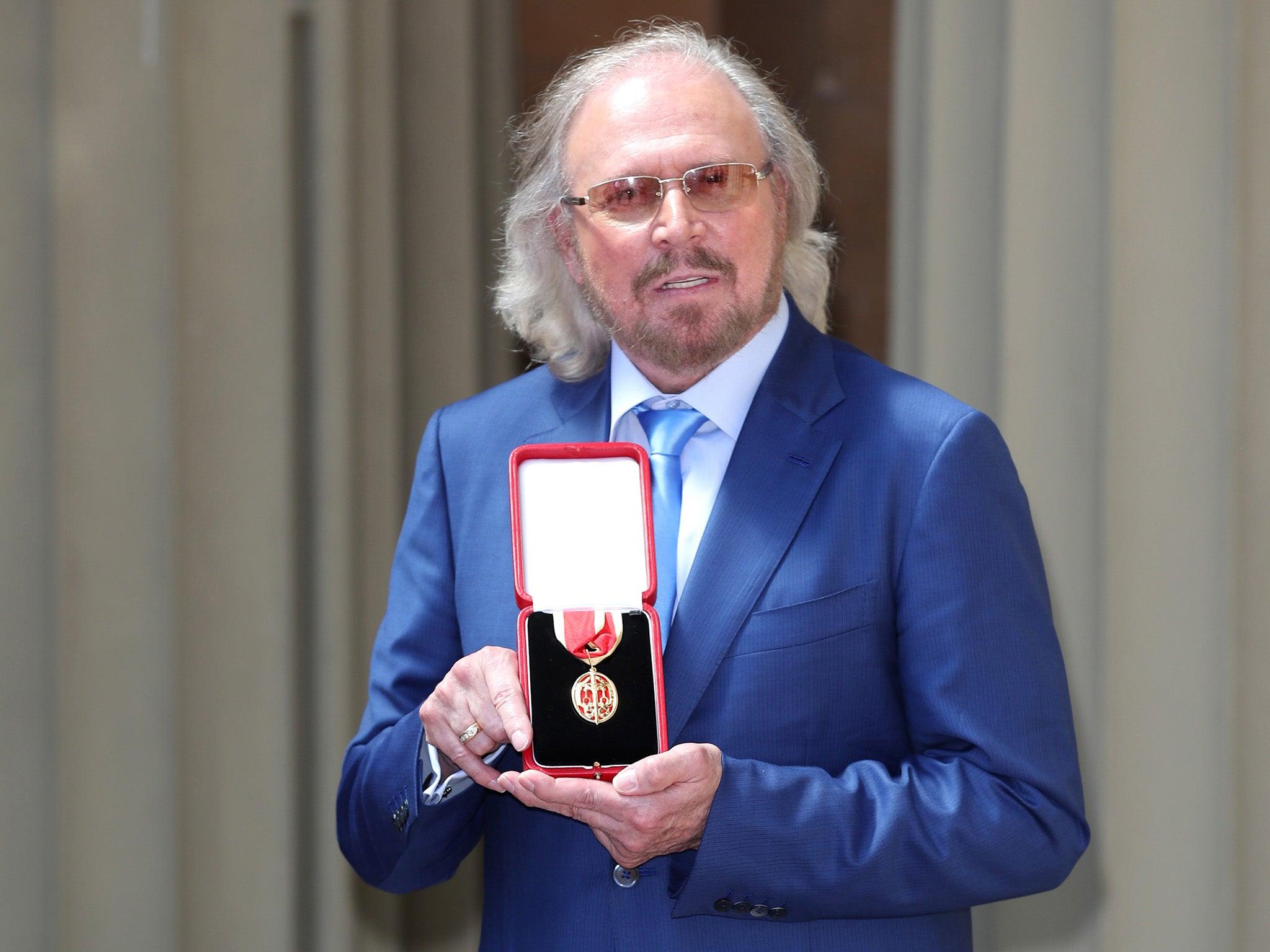 Sir Barry Gibb knighted at Buckingham Palace by Prince Charles: 'If