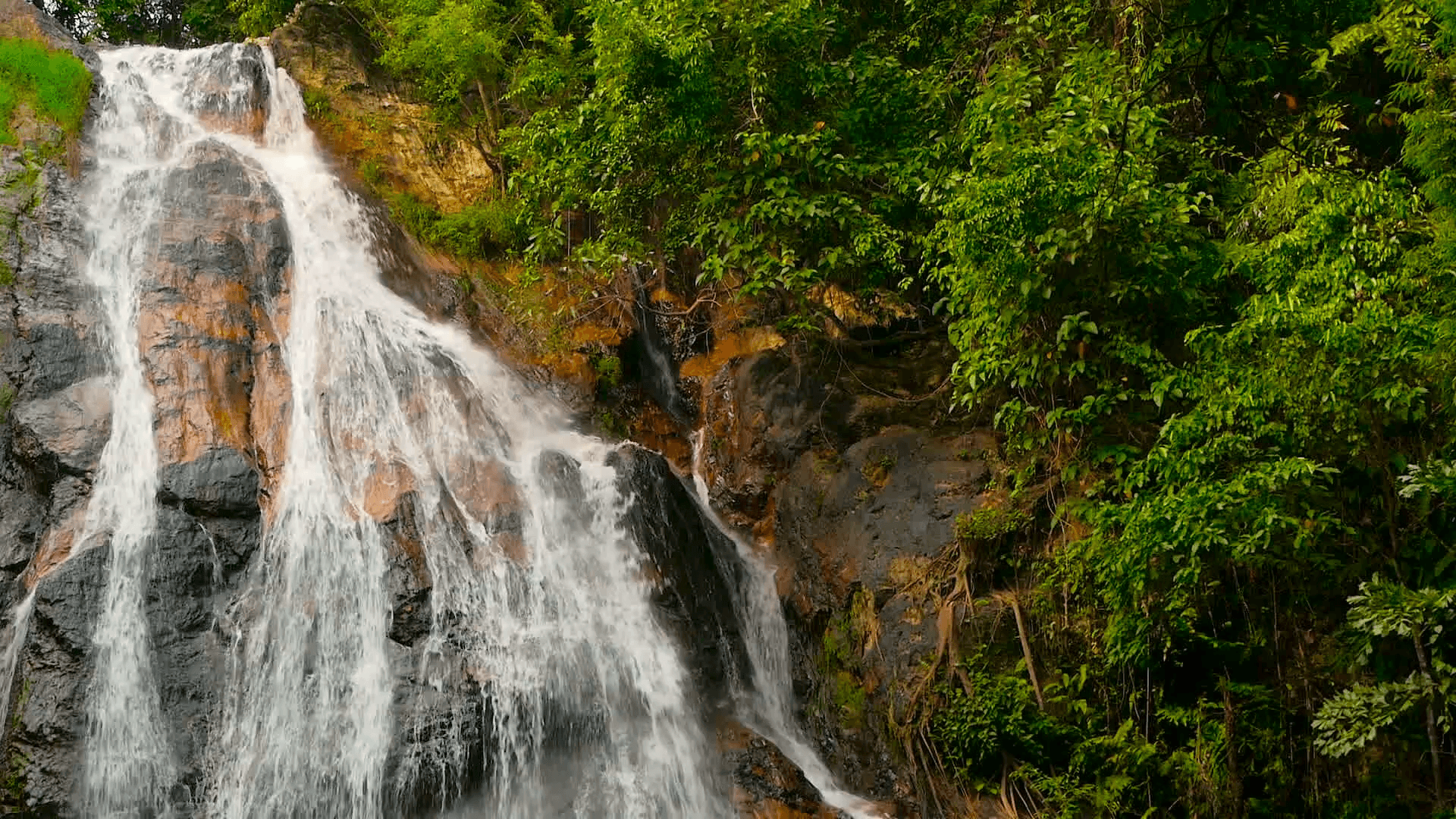 Jungle paradise landscape of tropical country. Waterfall cascade