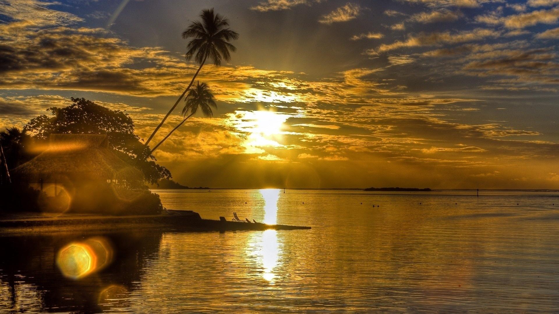 Download wallpaper 1920x1080 sun, sunset, reflections, palm, island
