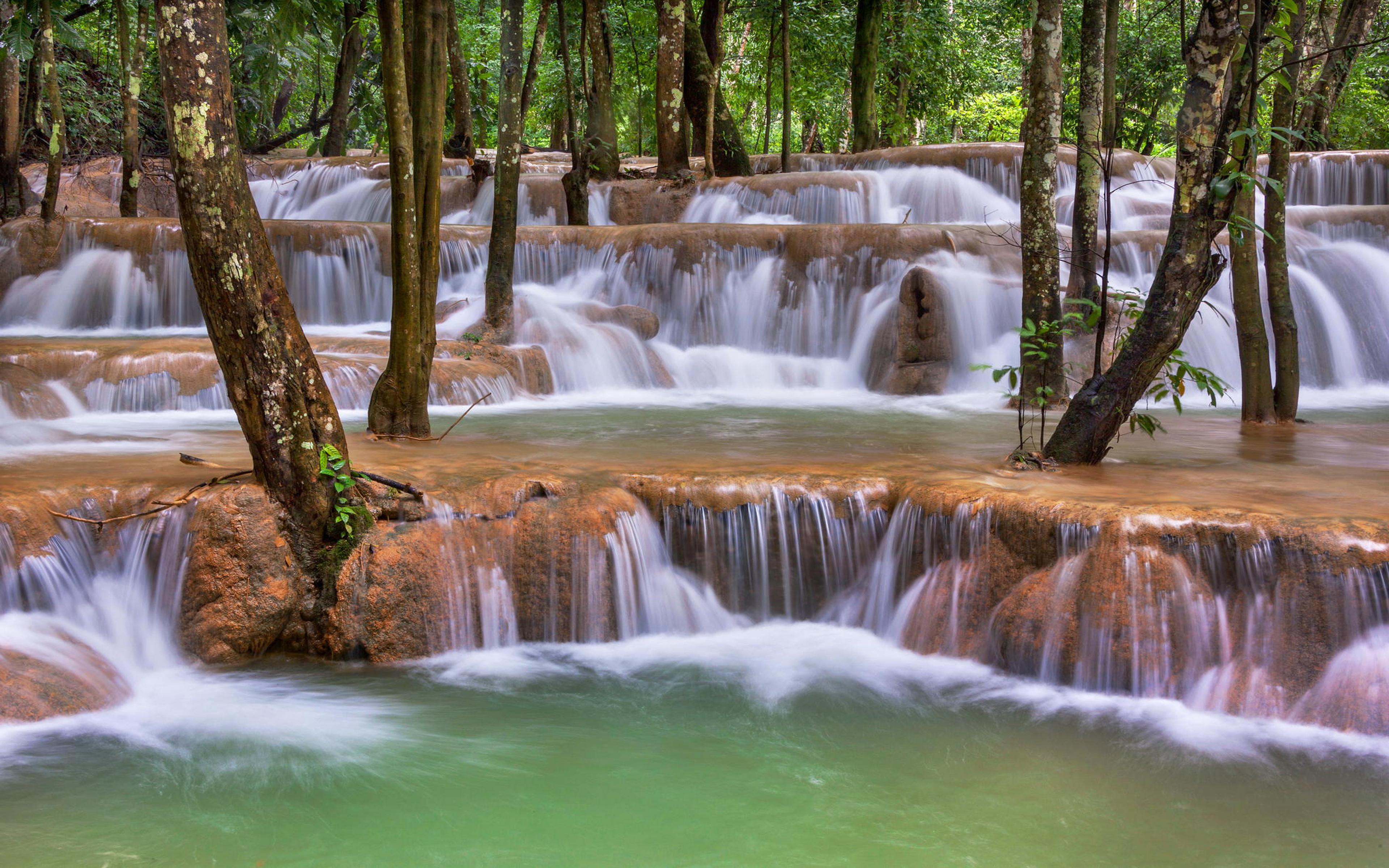 Lovely Cascading Waterfall Trees Green Translucent Water Wallpaper