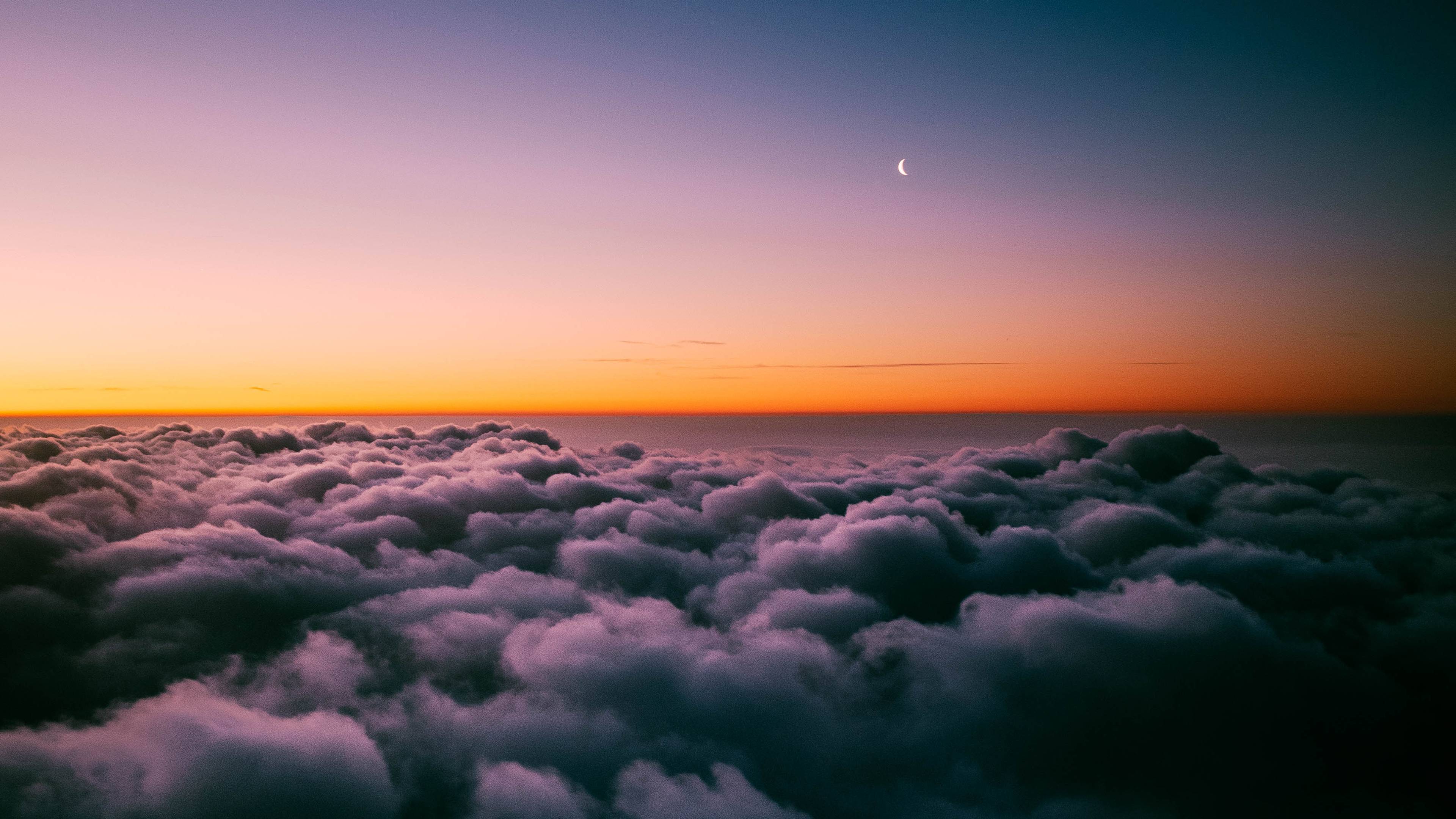 Sunset Horizon Above Clouds 4K Wallpaper