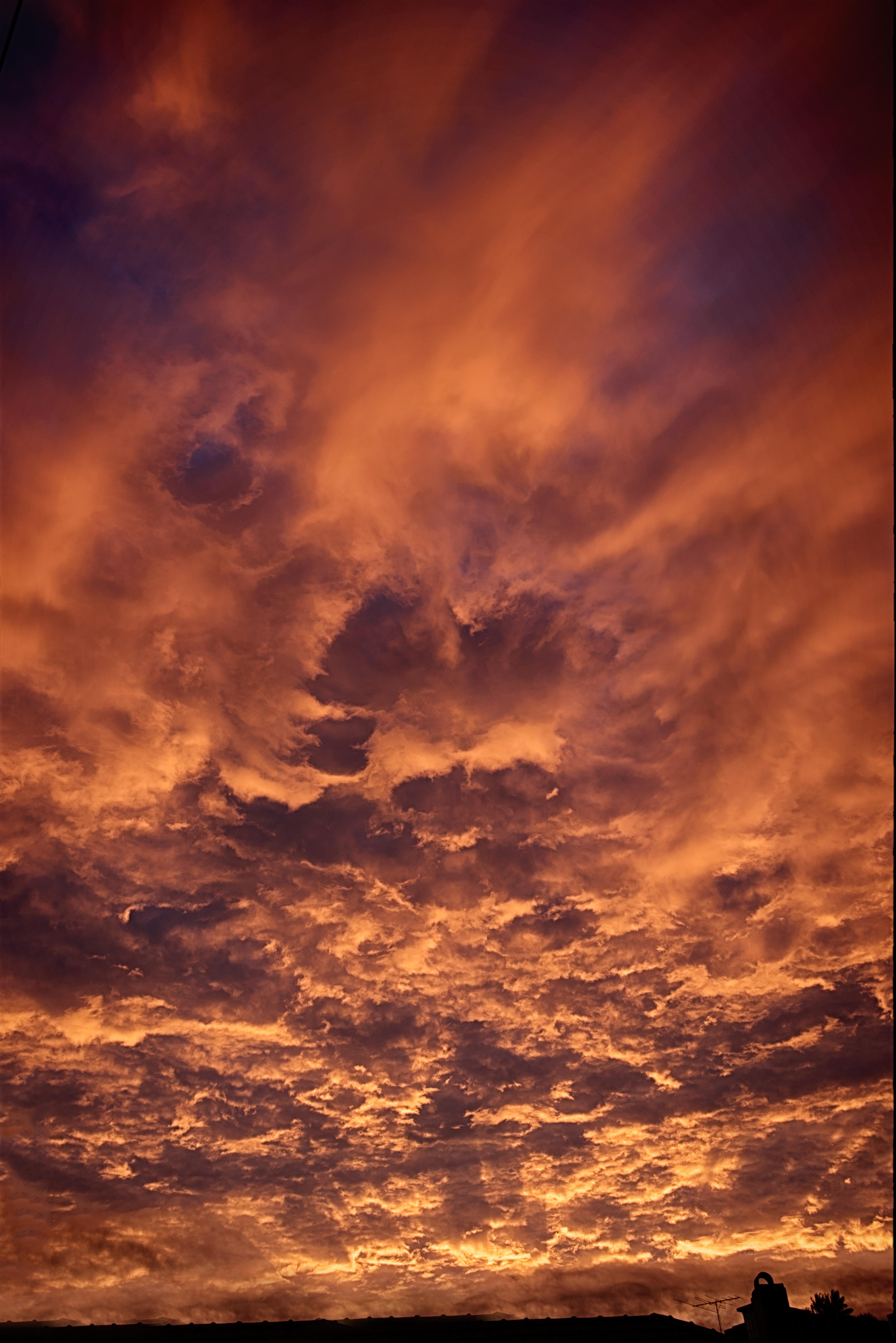 Low Angle Photography Of Clouds During Golden Hour Wallpaper