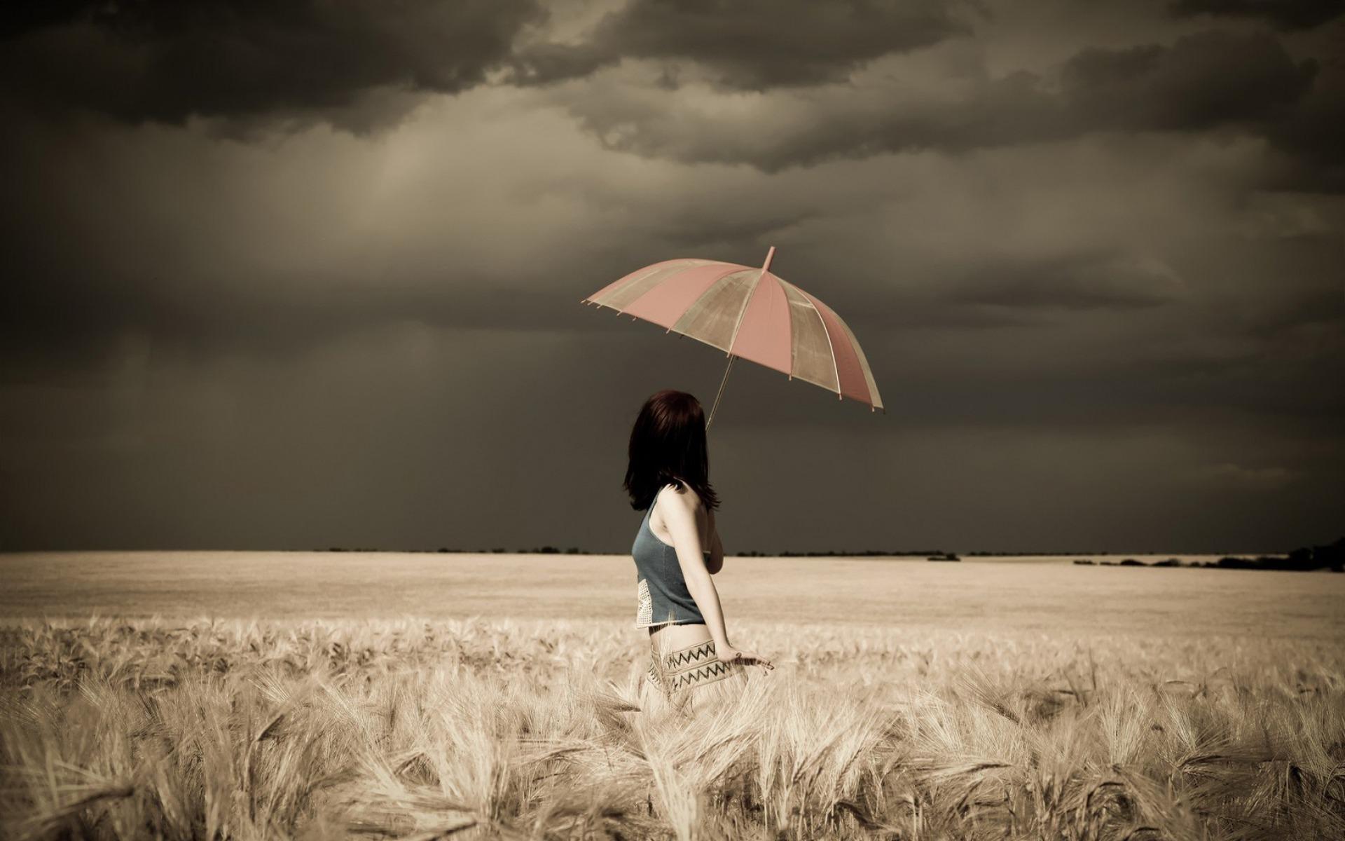 Woman Umbrella Field Stormy wallpaper. Woman Umbrella Field