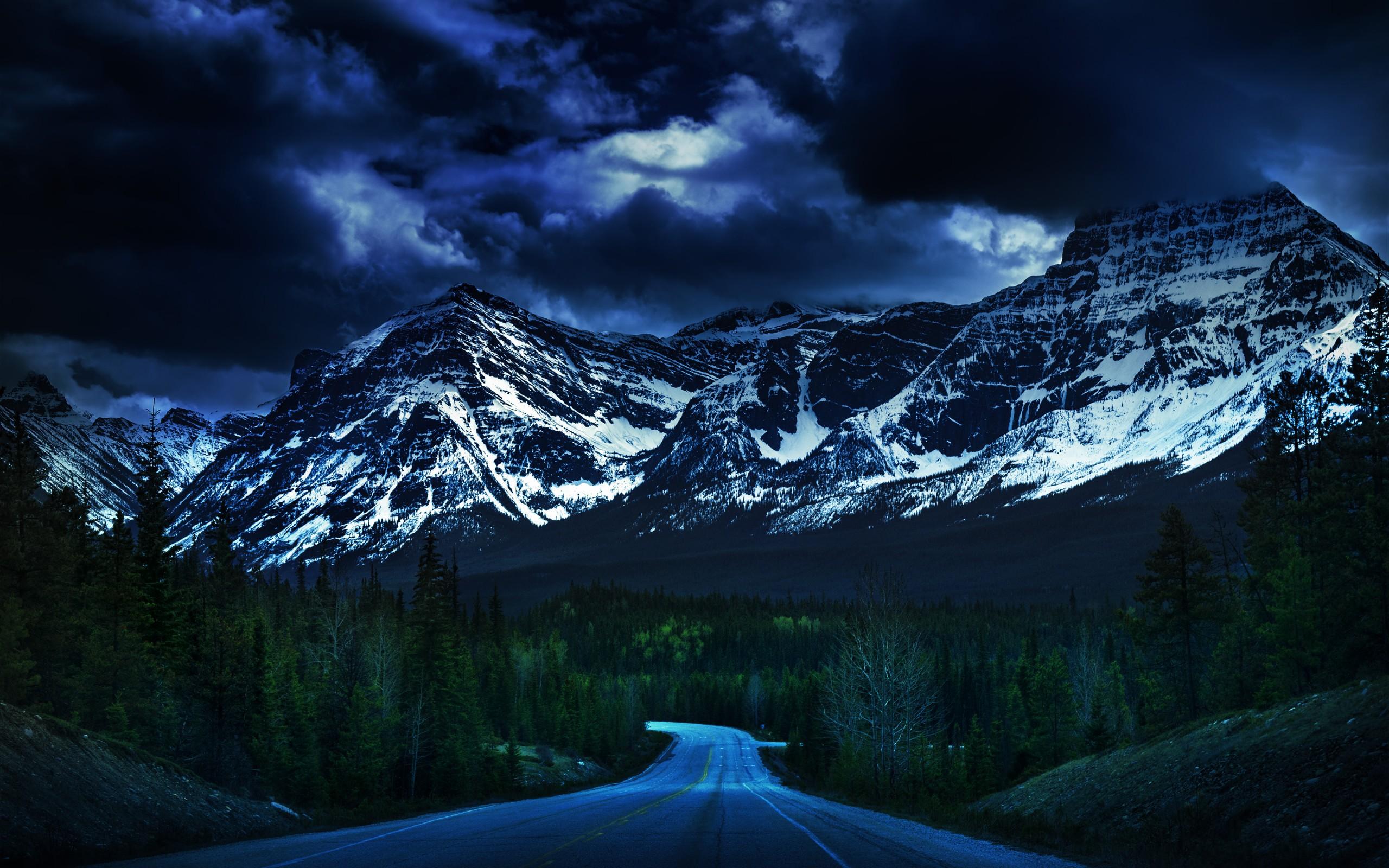 Dark Clouds over Mountain Road HD Wallpaper. Background Image