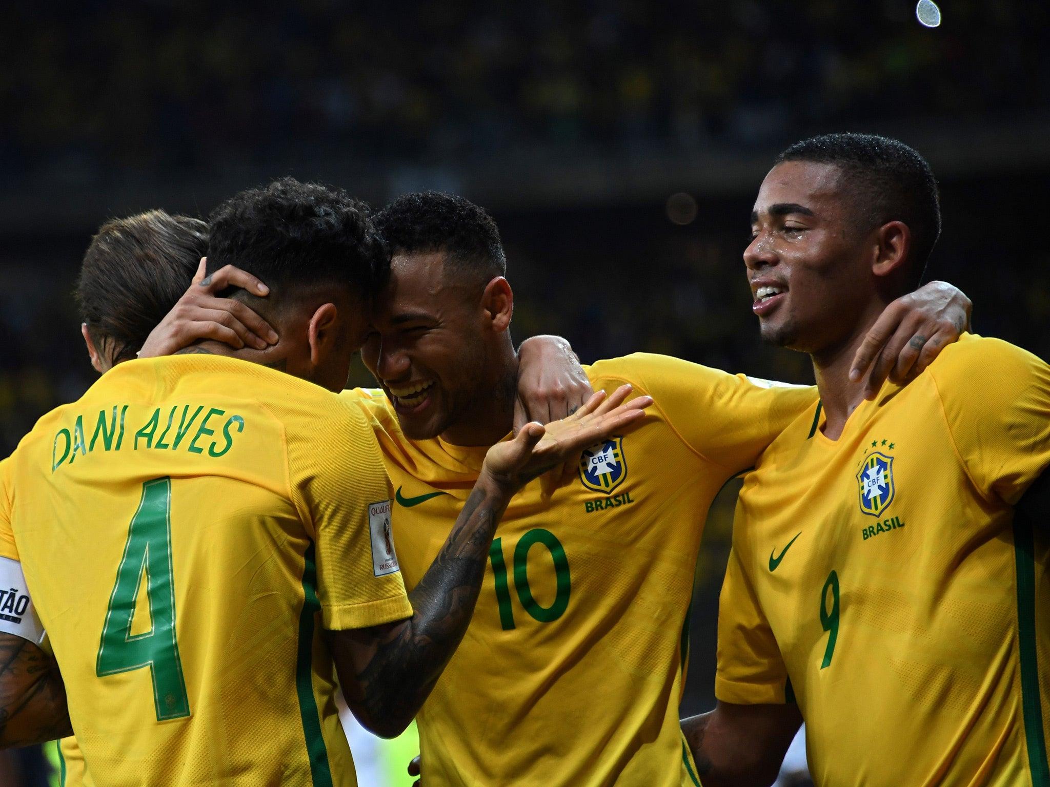 Manchester City striker Gabriel Jesus speaks to Dani Alves about
