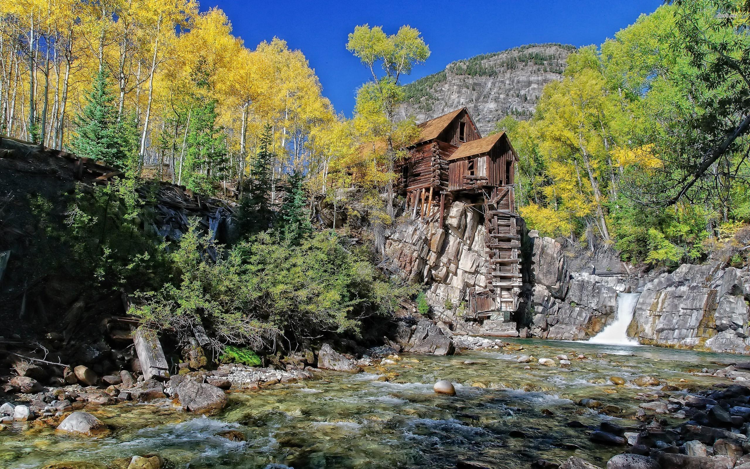 Riverside mountain cabin wallpaper wallpaper