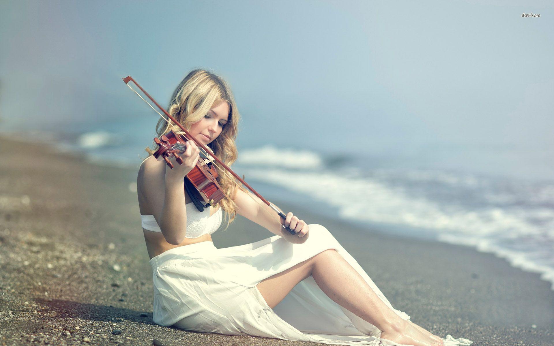 Playing the violin on the beach wallpaper wallpaper