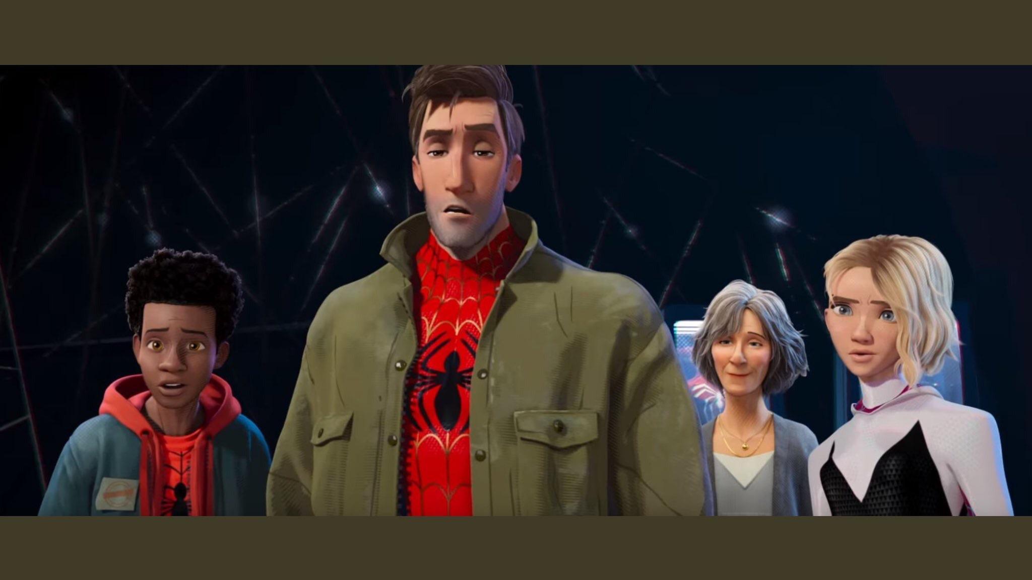 Oooo! I spy a very familiar suit behind Aunt May in the new Into