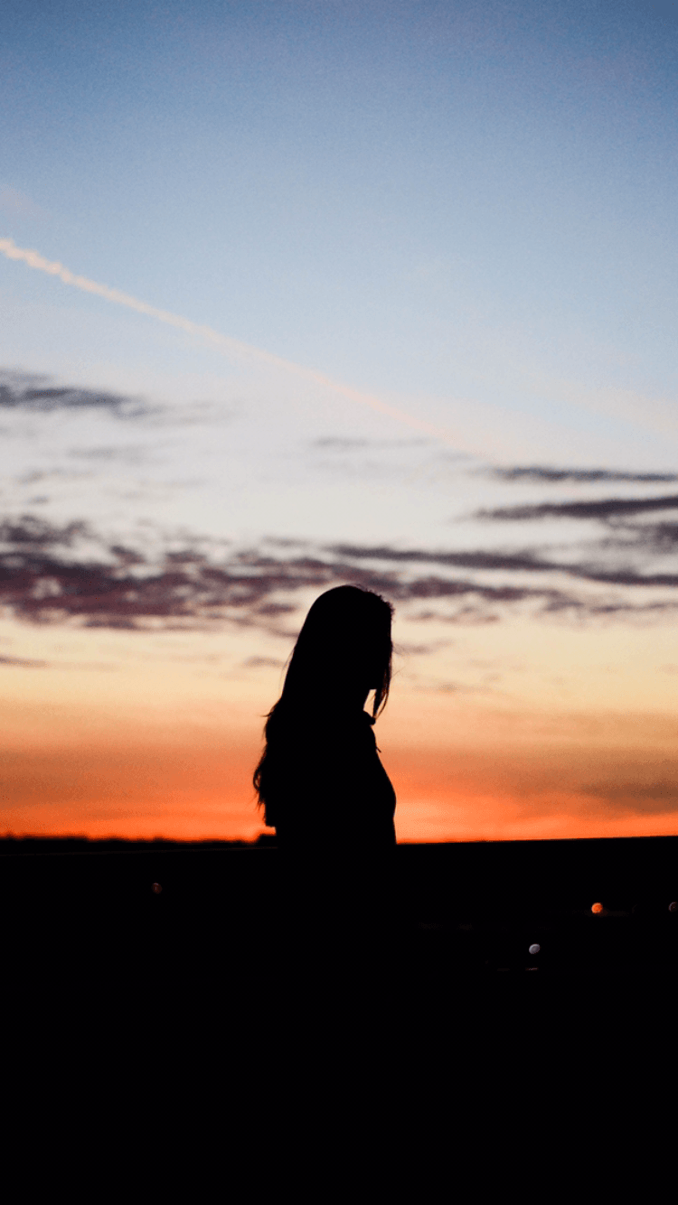 sunset silhouette woman