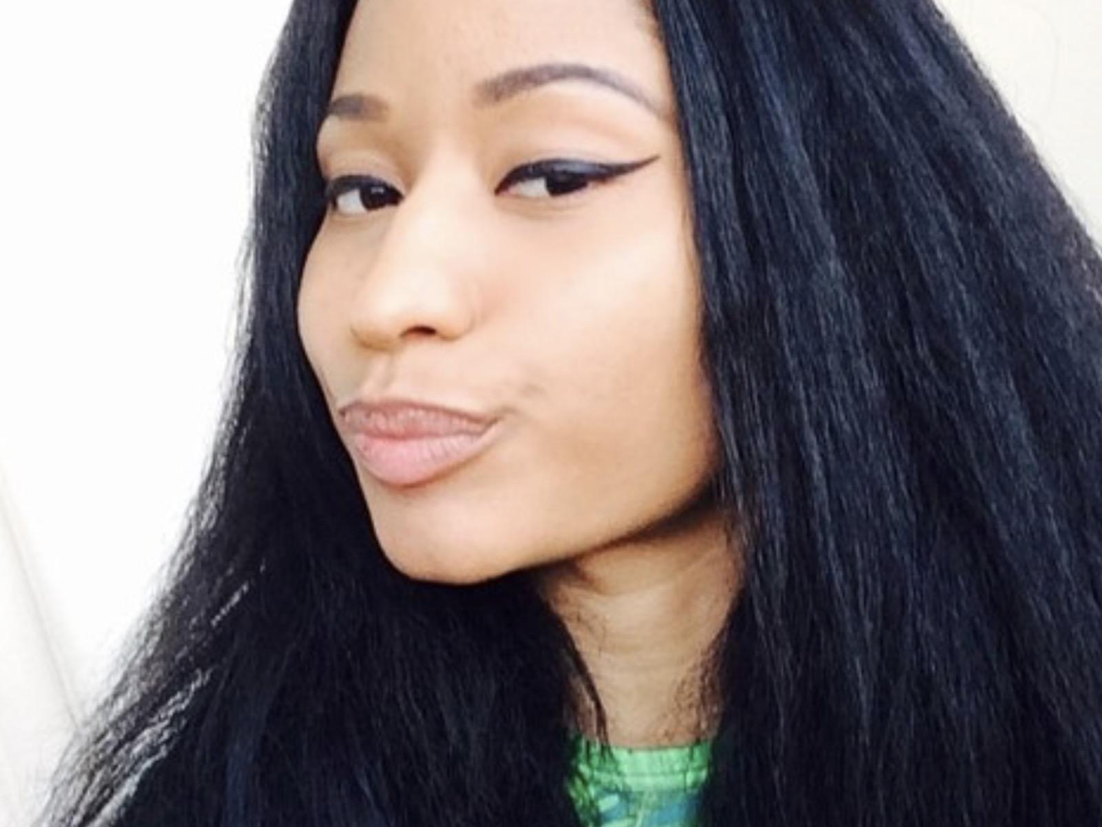 Look: Nicki Minaj Shares New Steamy Pics + Reacts To MEGATRON