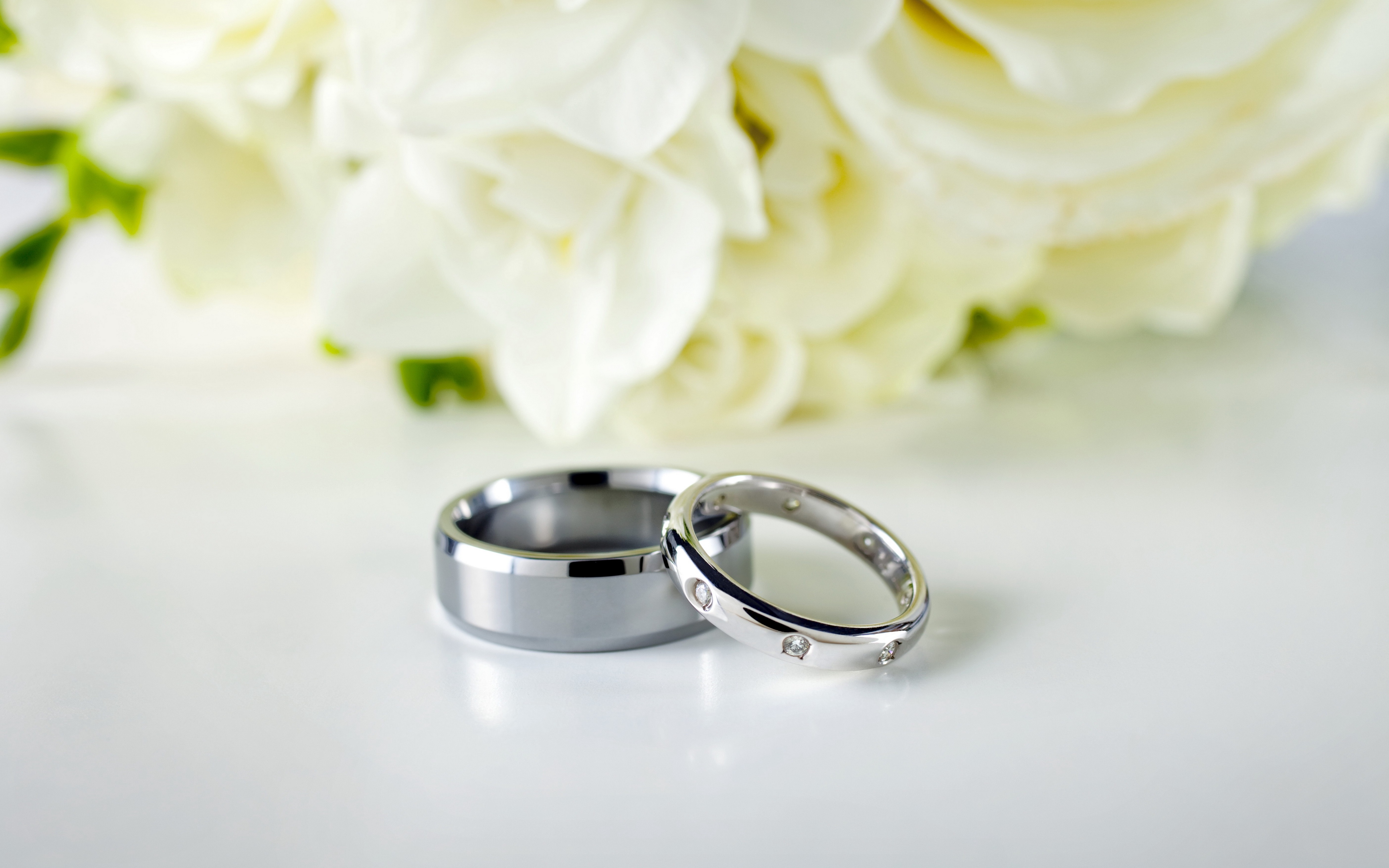 Download wallpaper 3840x2400 rings, couple, wedding, silver, flowers