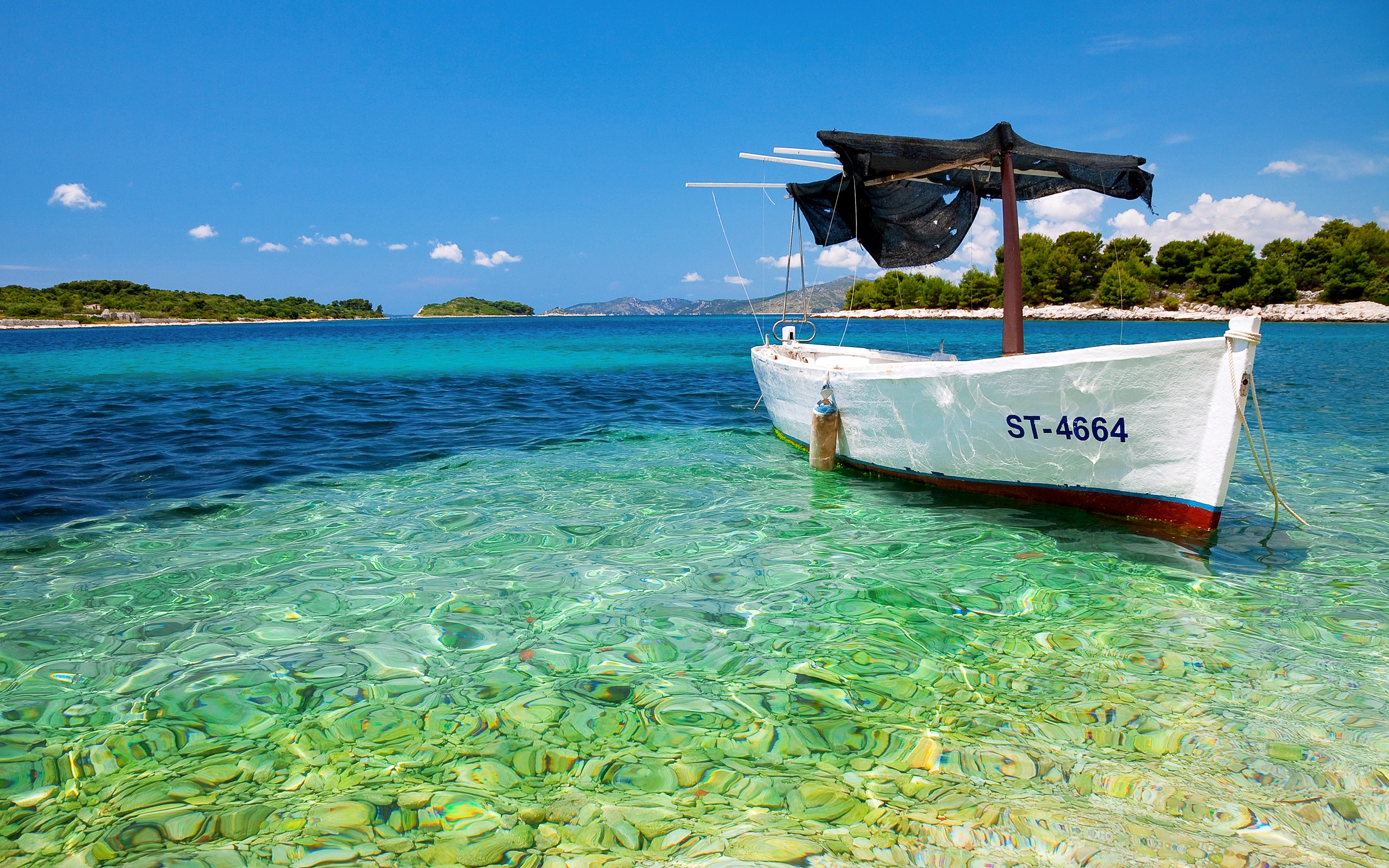 Boat on Beautiful Transparent Water River Wallpaper