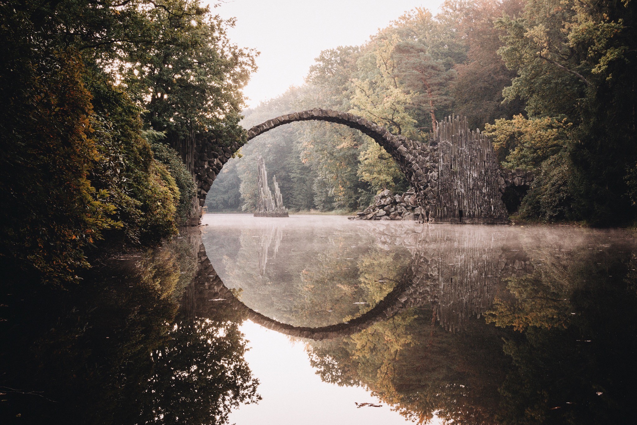 johannes hulsch bridge lake water forest stone arch arch