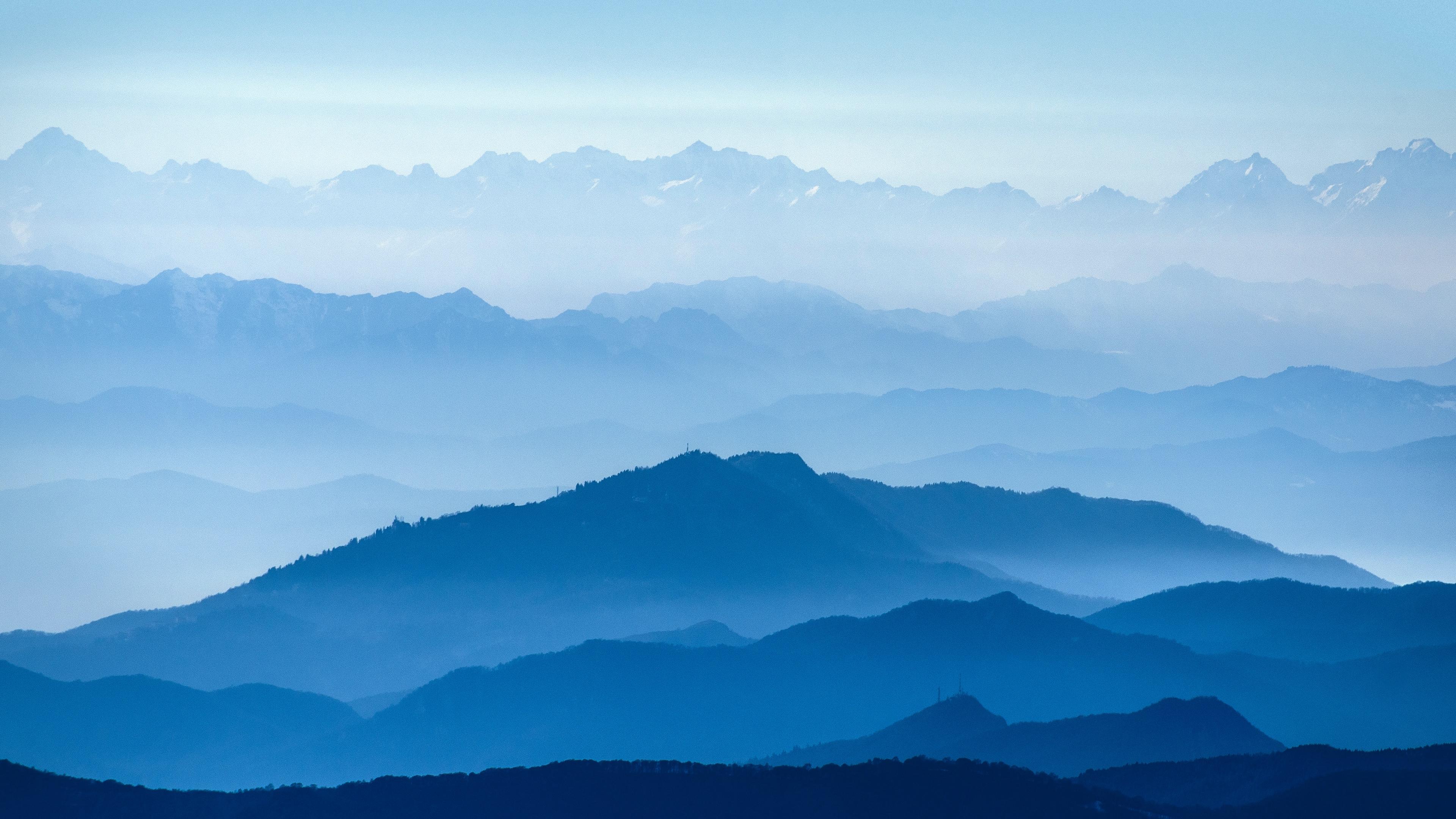 Download wallpaper 3840x2160 mountains, fog, sky, blue, white 4k uhd 16:9 HD background