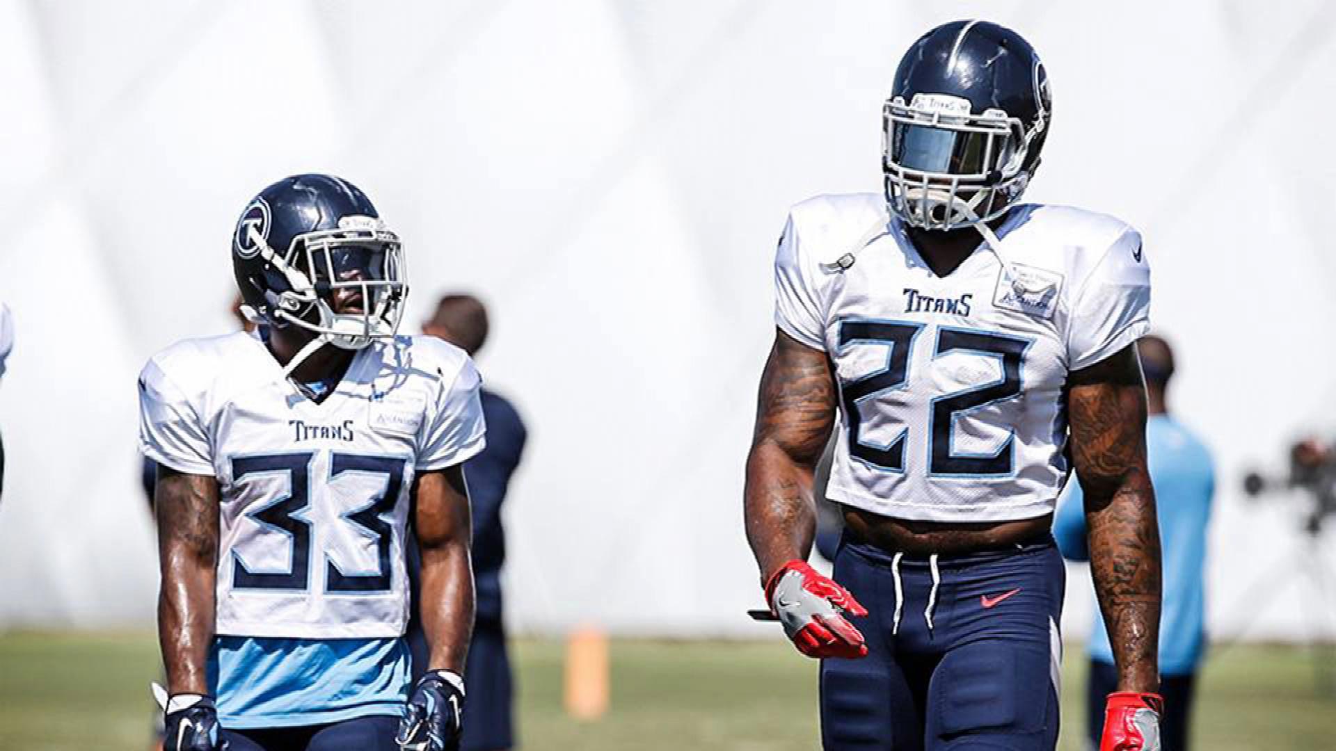 Tennessee Titans' Derrick Henry towers over fellow running back Dion