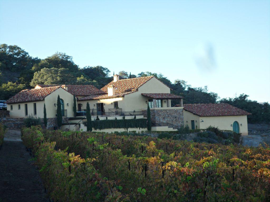 Tuscan Inspired Vineyard Estate With Panoramic Vineyard And Mountain Views