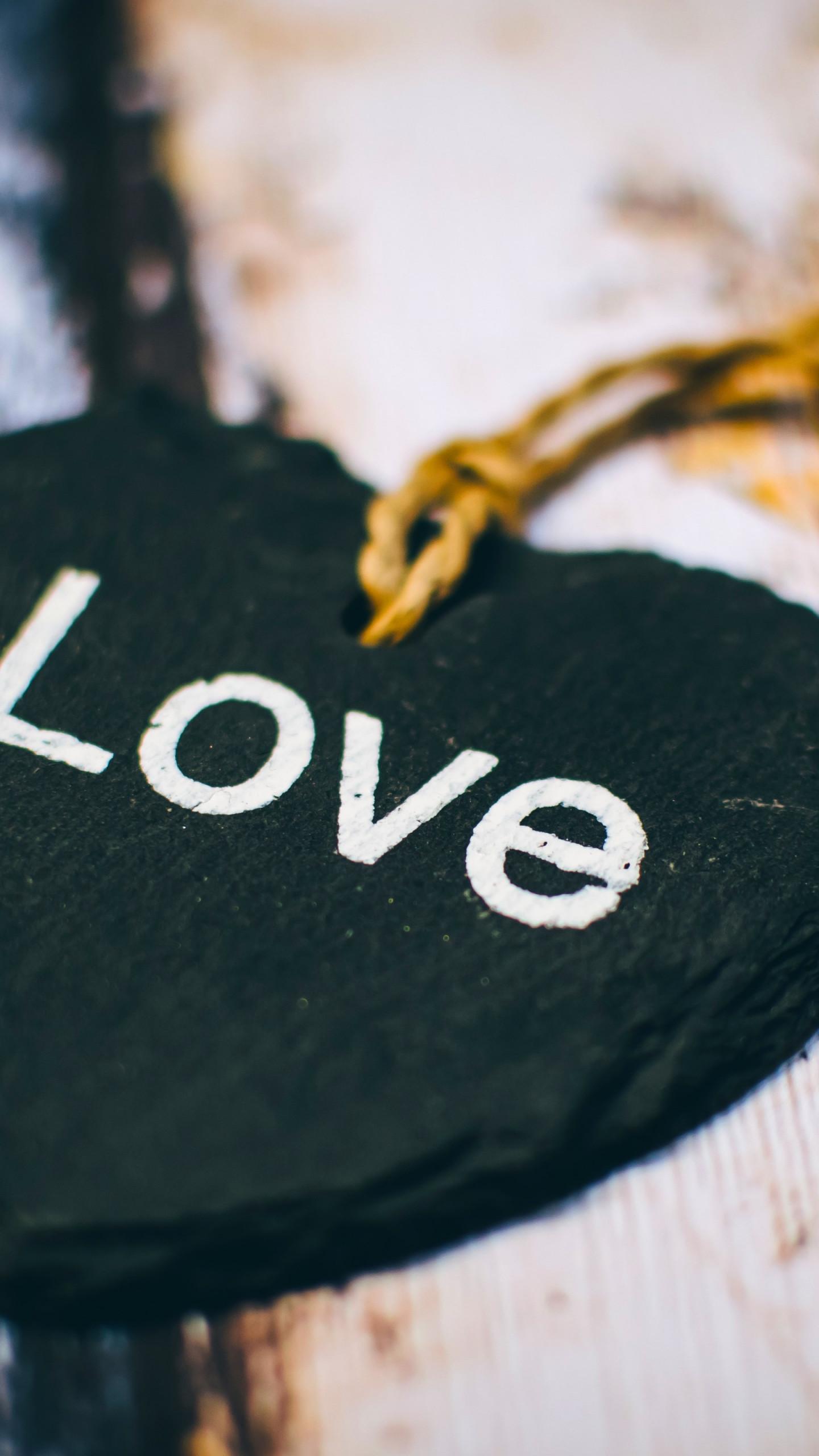 Download wallpaper: Love message on heart medallion 1440x2560