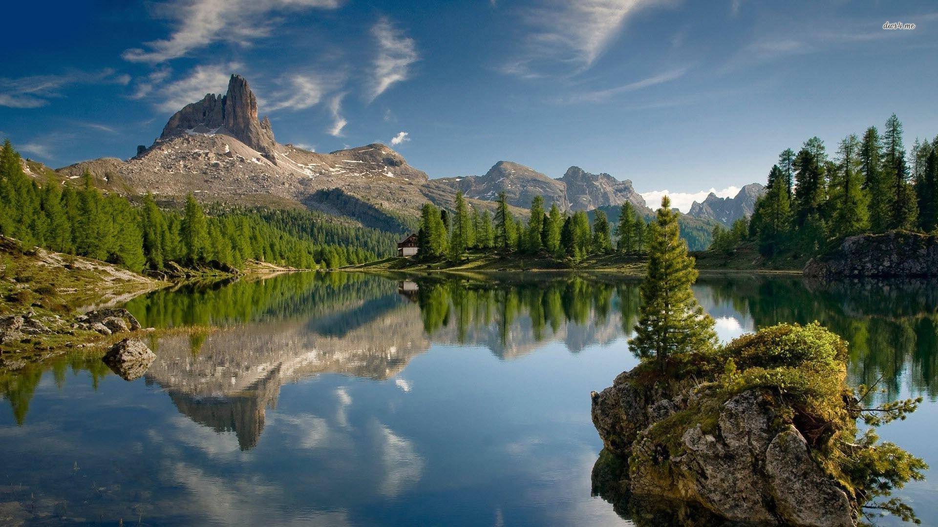 Lake Federa reflecting the Dolomites, Italy wallpaper