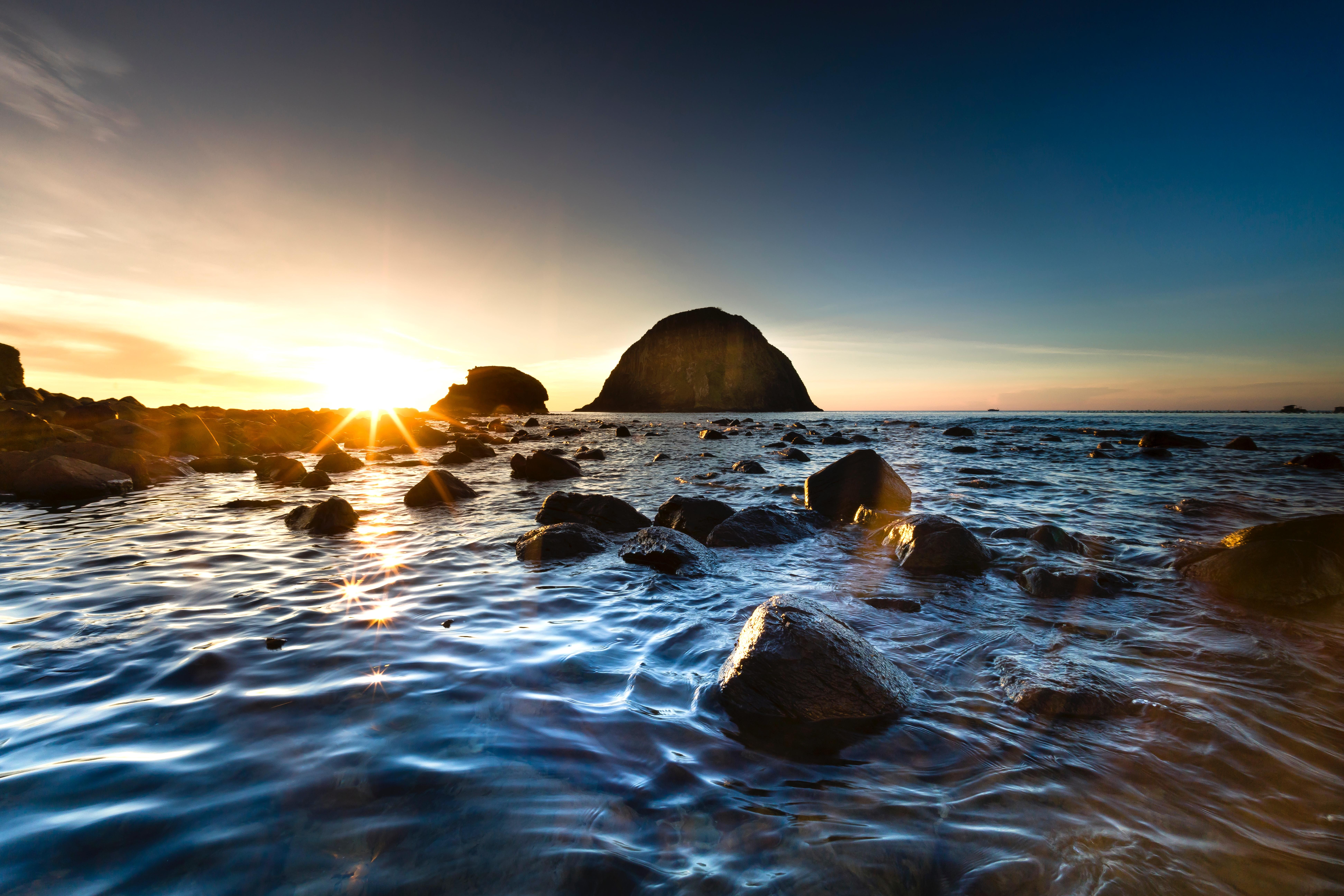 Photo of Rocky Shore During Dawn · Free