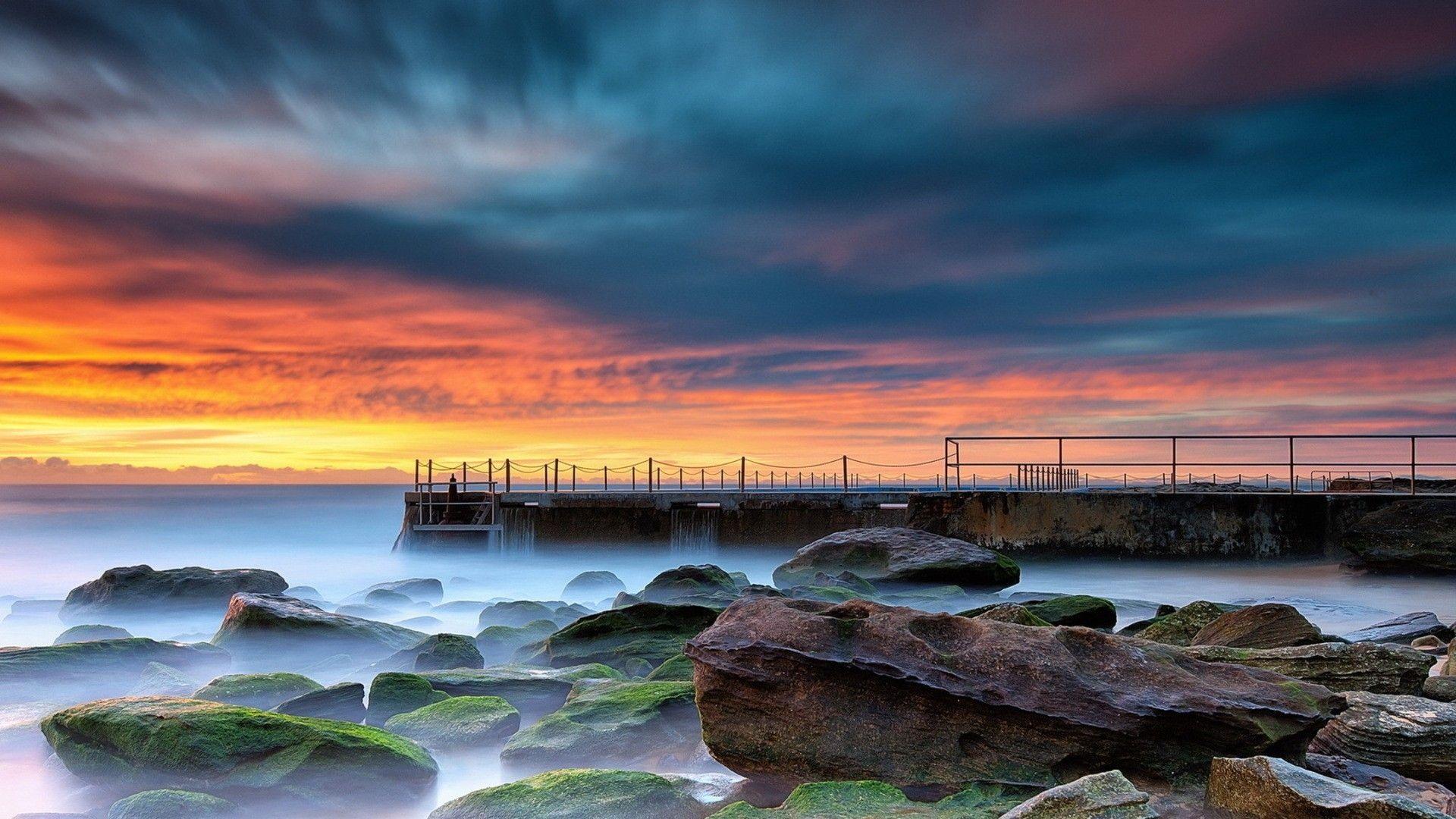 Wharf on a rocky shore at sunset 1920x rocky, shore, sunset