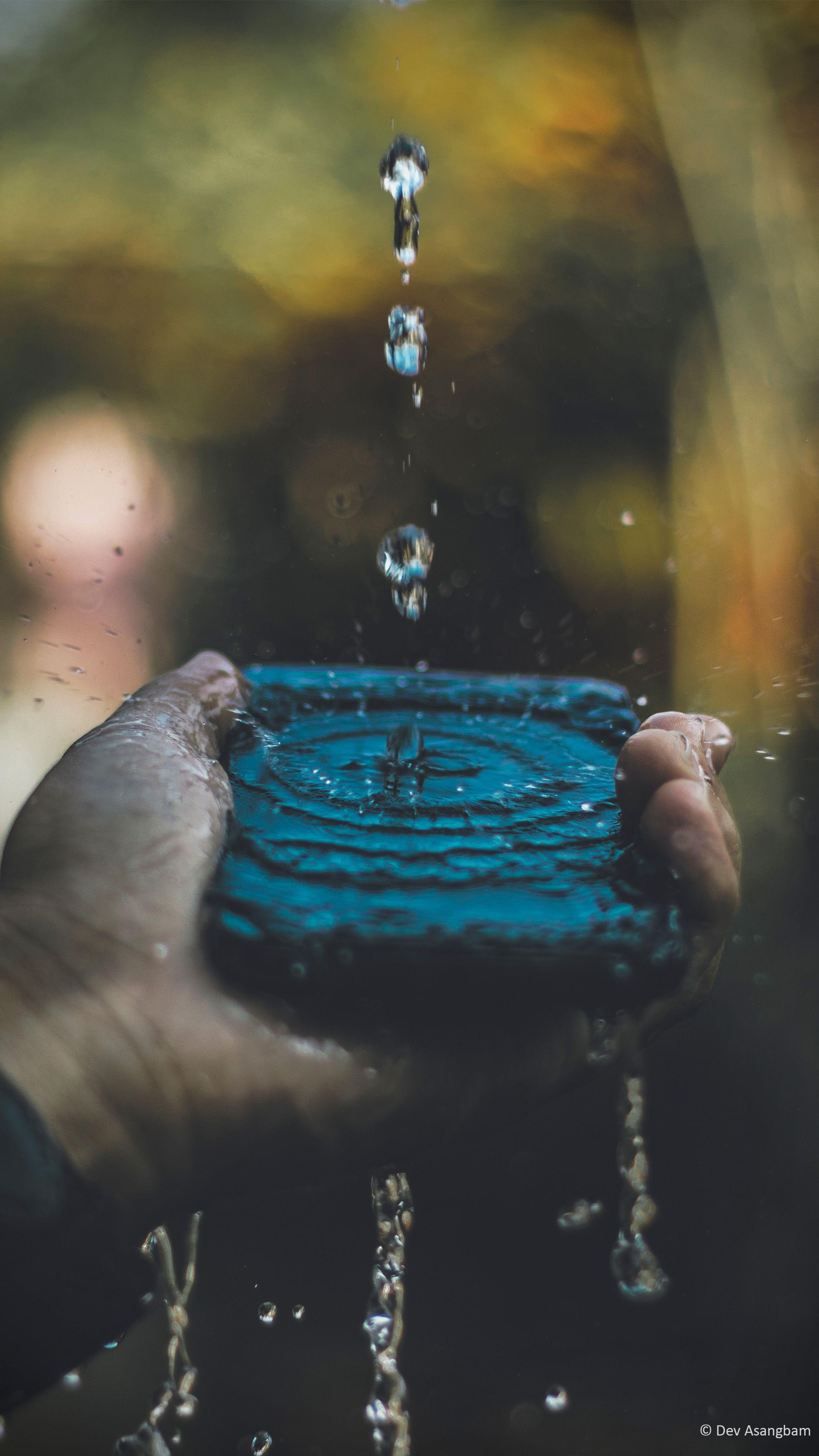 Hand Mobile Phone Water Splash. Photography