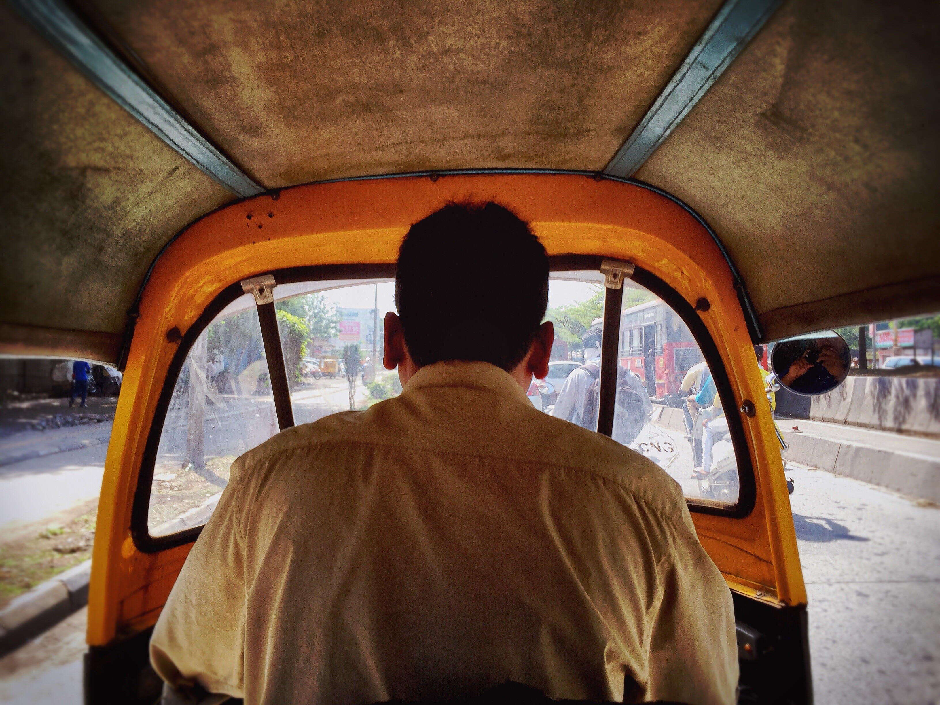 man driving on auto rickshaw free image