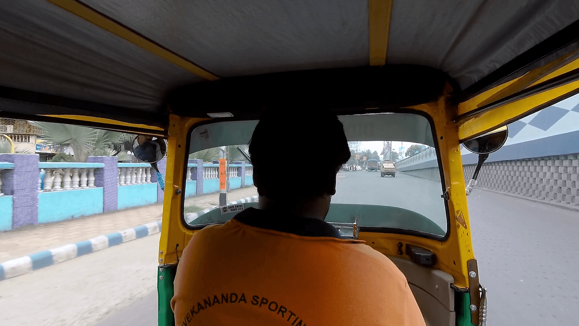 Inside of an Indian Auto rickshaw in busy roads with vehicles, point of view of passenger Stock Video Footage