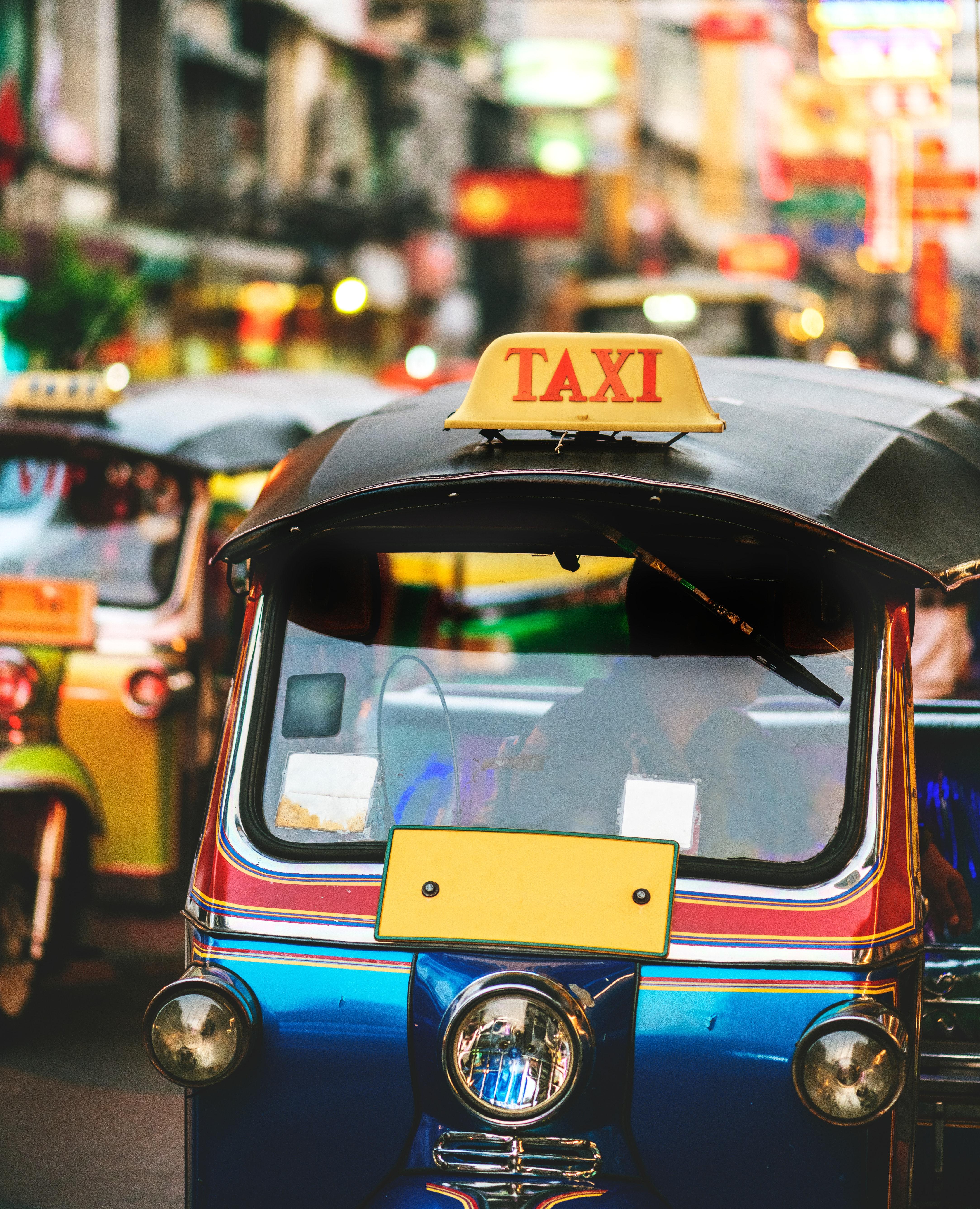 Selective Focus Photography Auto Rickshaws Taxis in Traffic · Free