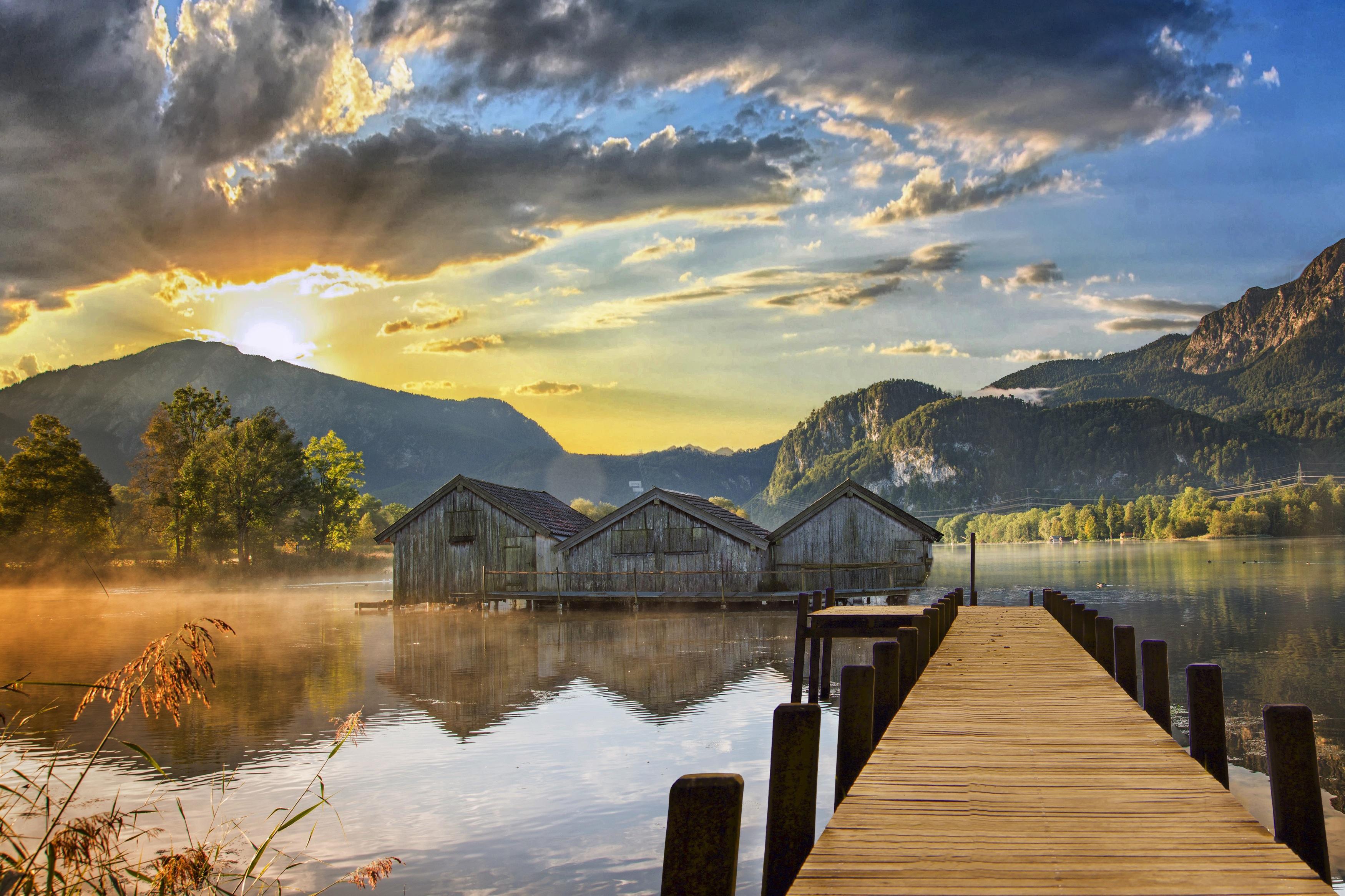 Sunset over a Lake Boathouse HD Wallpaper. Background Image