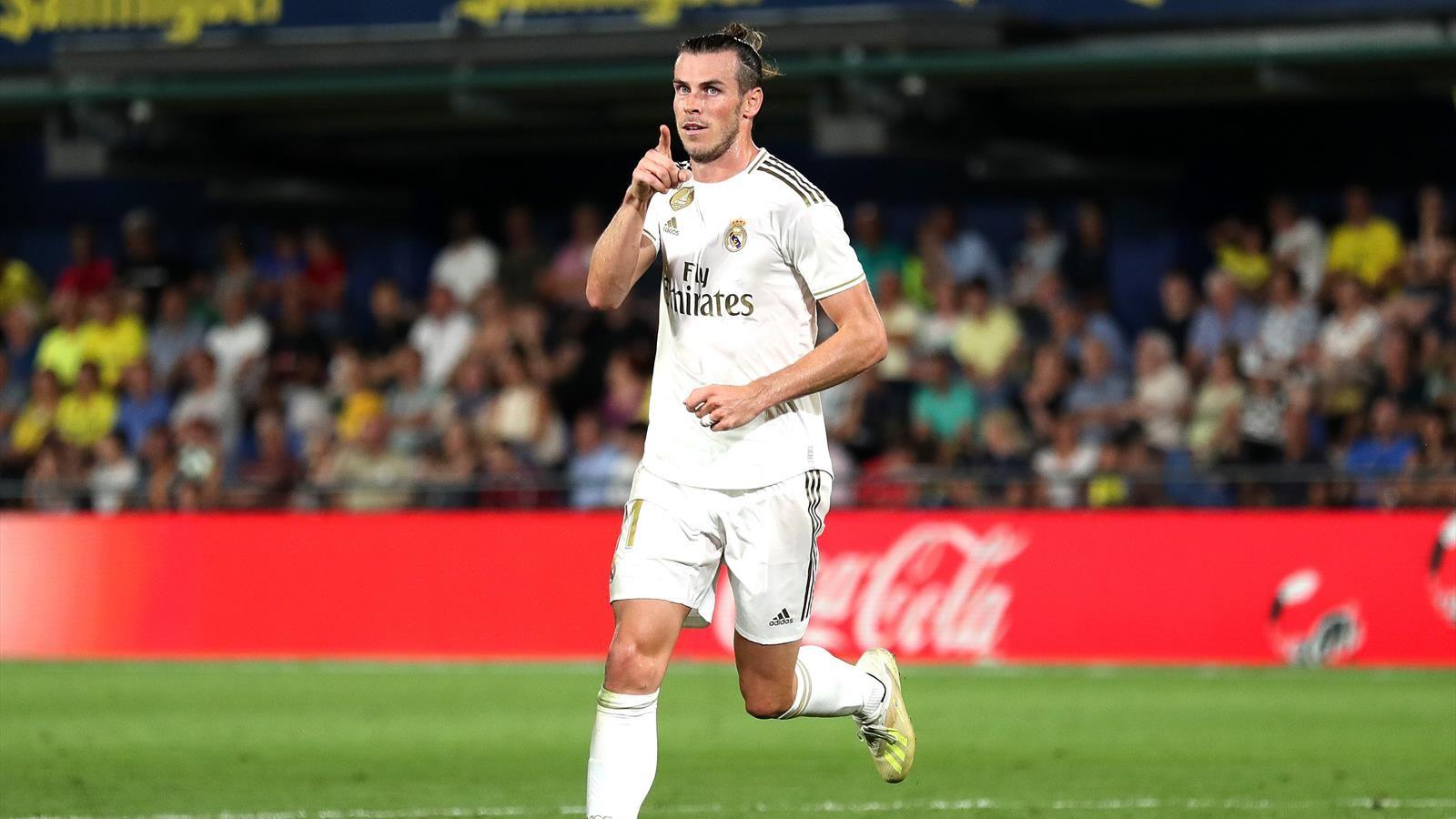 Football news Bale hits brace, sees red as Madrid salvage