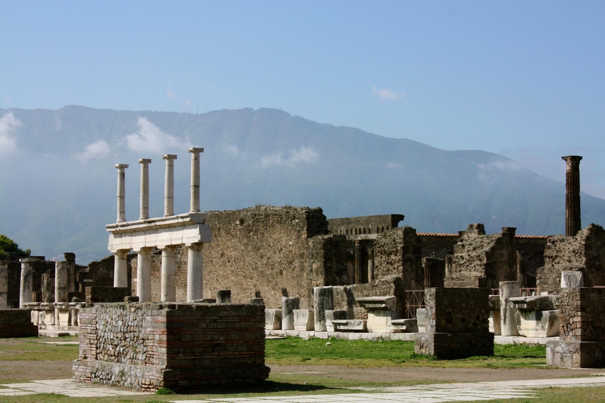 The ruins of Pompeii on a background of mountains, Italy