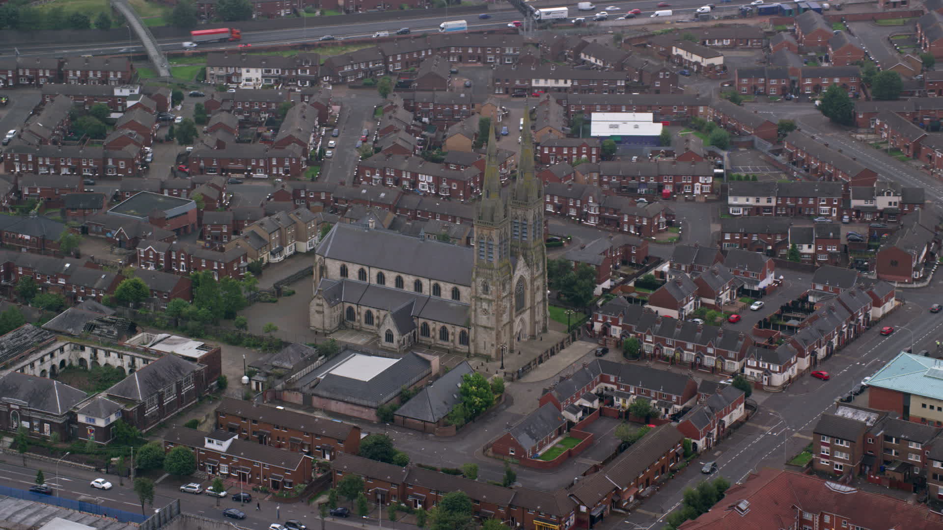 6K stock footage aerial video of orbiting St Peter's Cathedral, Belfast, Northern Ireland Aerial Stock Footage AX113_112