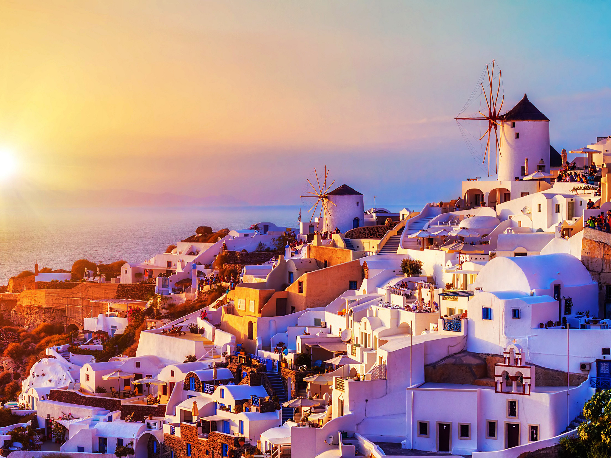 The spectacular sunset over the Oia village in Santorini