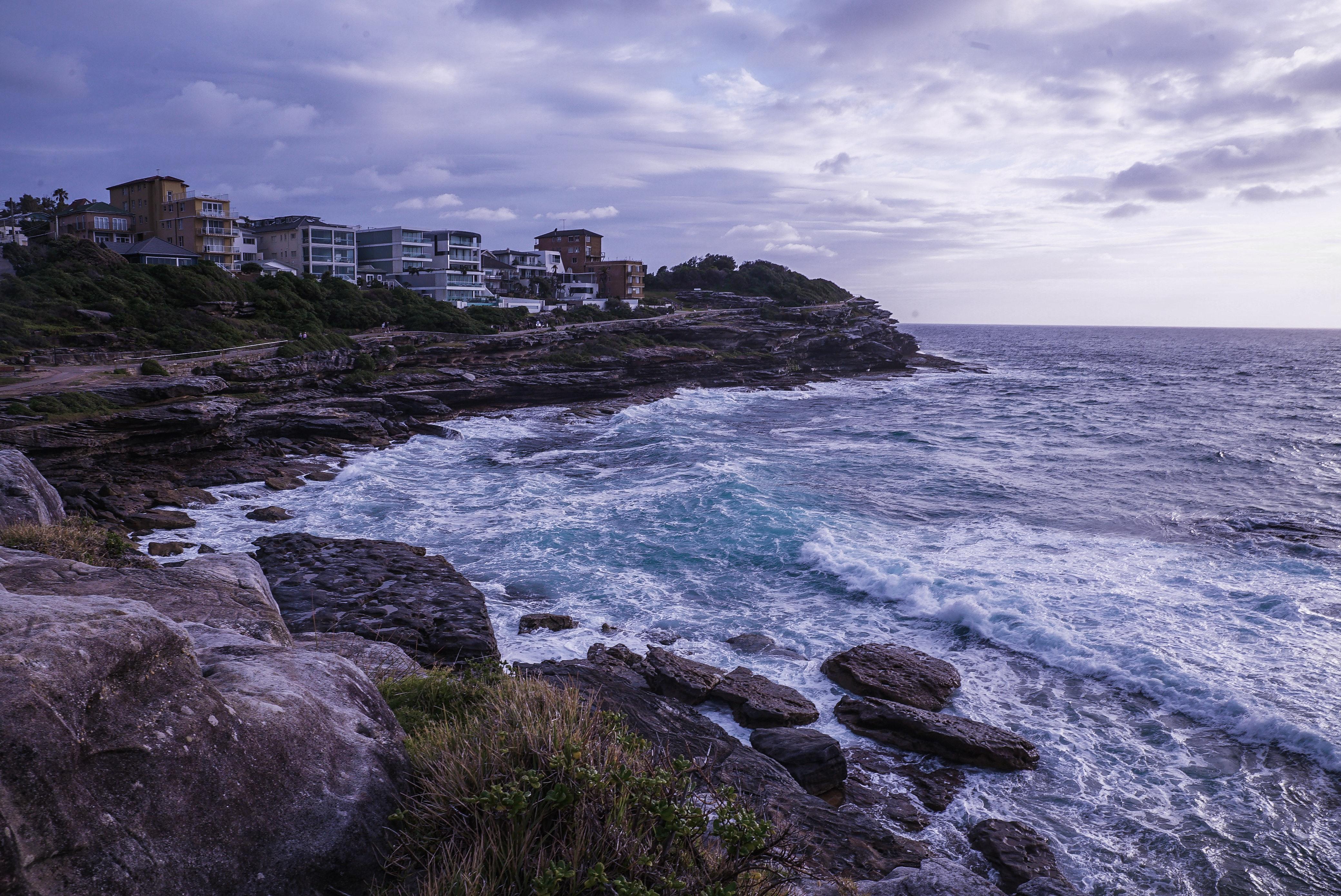 Beach Ocean Rocks Stones Clouds HD wallpaper