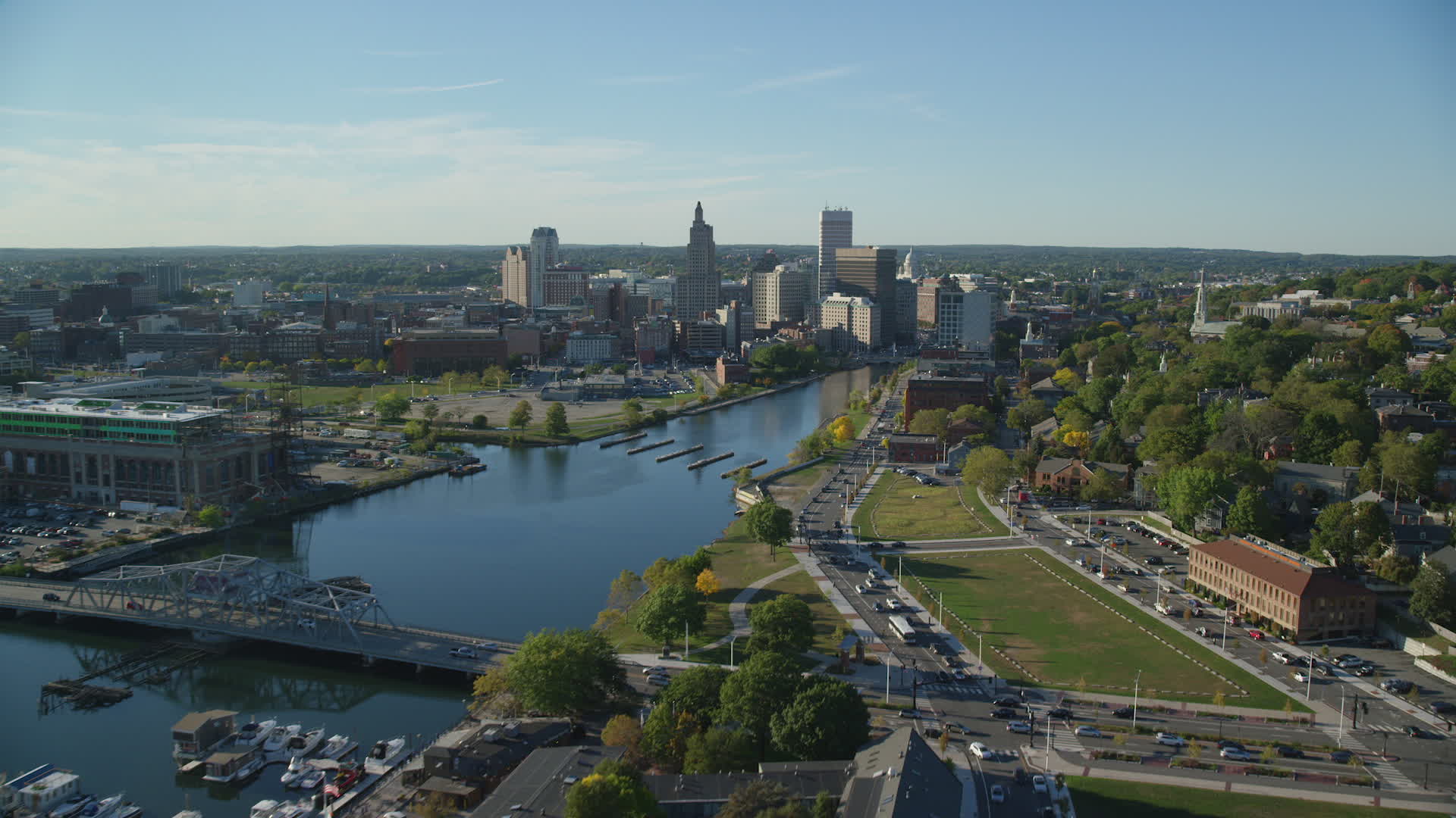 6k stock footage aerial video flying by Providence River, approach skyline, Downtown Providence, Rhode Island Aerial Stock Footage AX145_084. Axiom