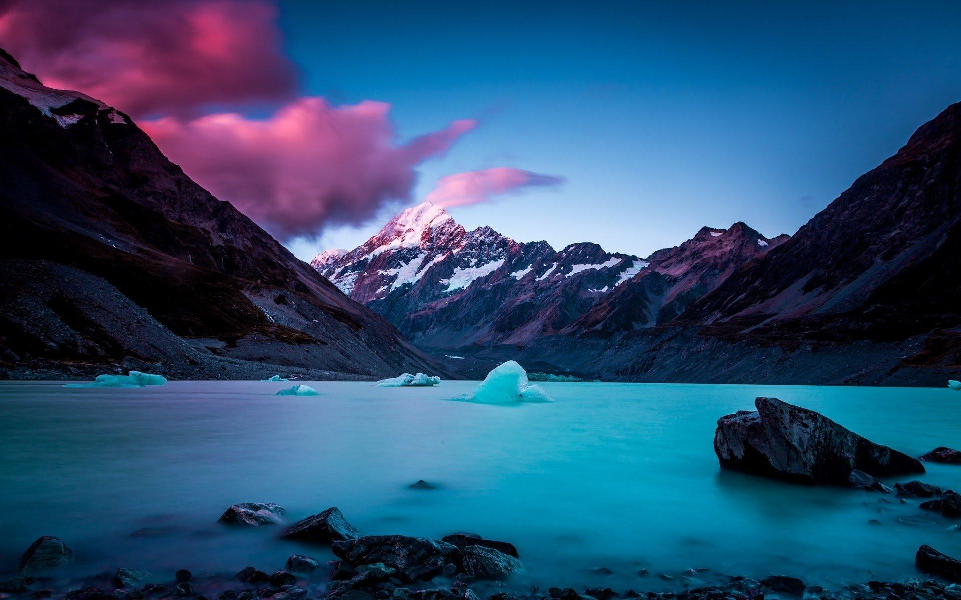 Pink Clouds over Icy Lake in the Mountains HD Wallpaper
