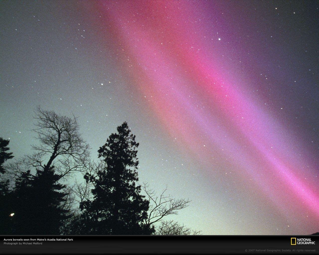 pink aurora borealis over Jordan Pond, Acadia National Park