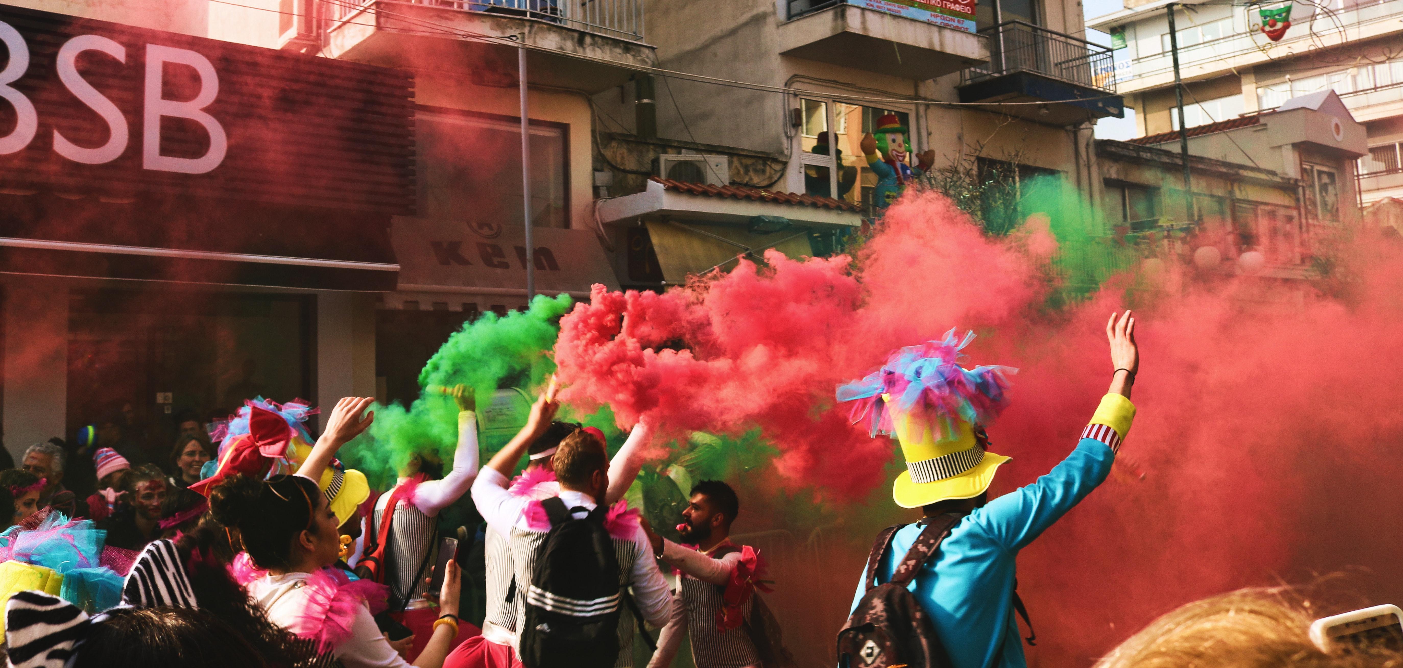 People Spraying Assorted Color Of Smoke · Free