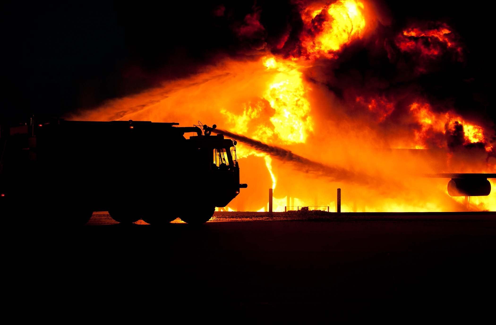 Firetruck Spraying Water on Fire · Free