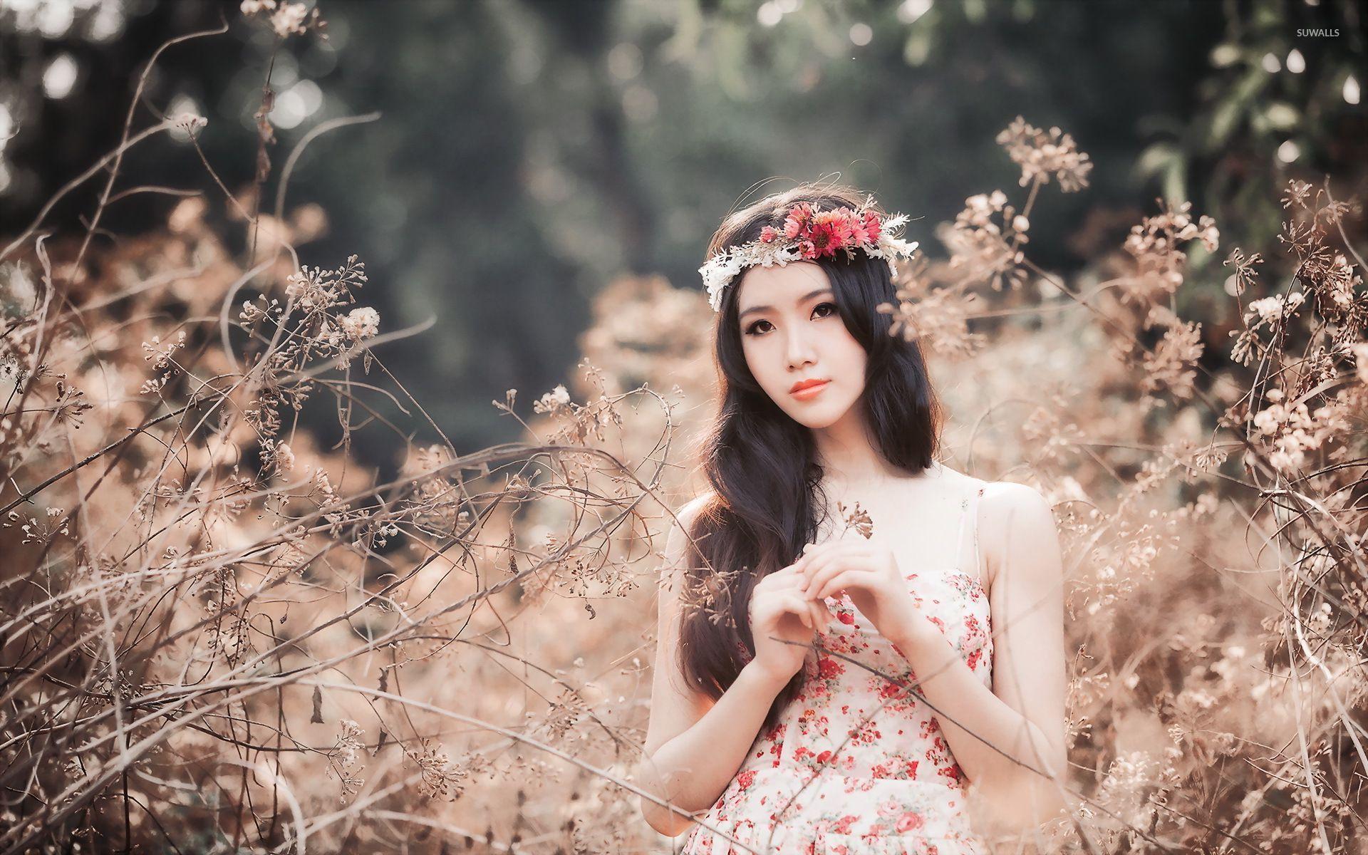 Model with a floral crown wallpaper wallpaper