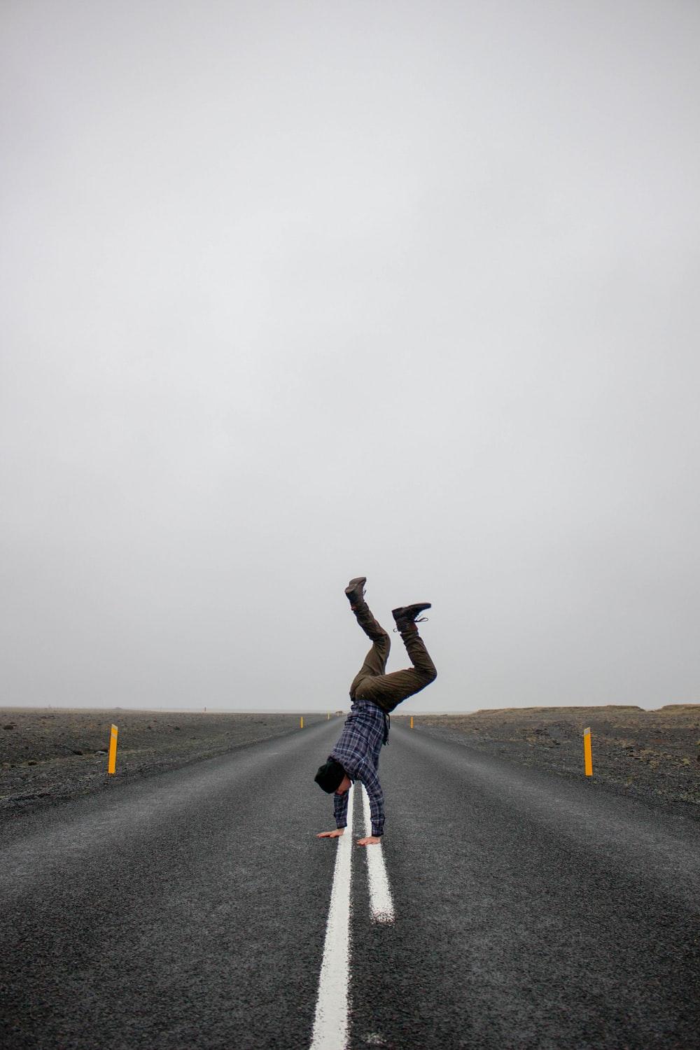 Handstand on road. HD photo