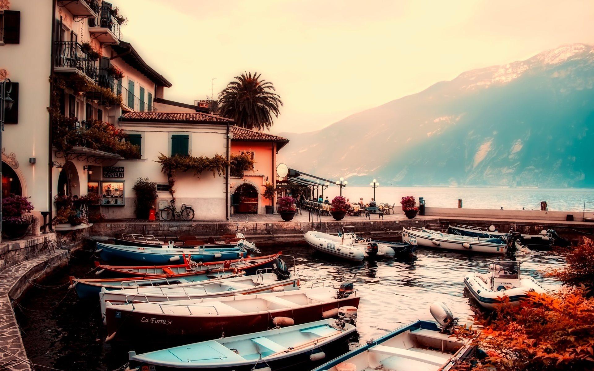 Download wallpaper Lake Garda, mountains, dock, boats, autumn