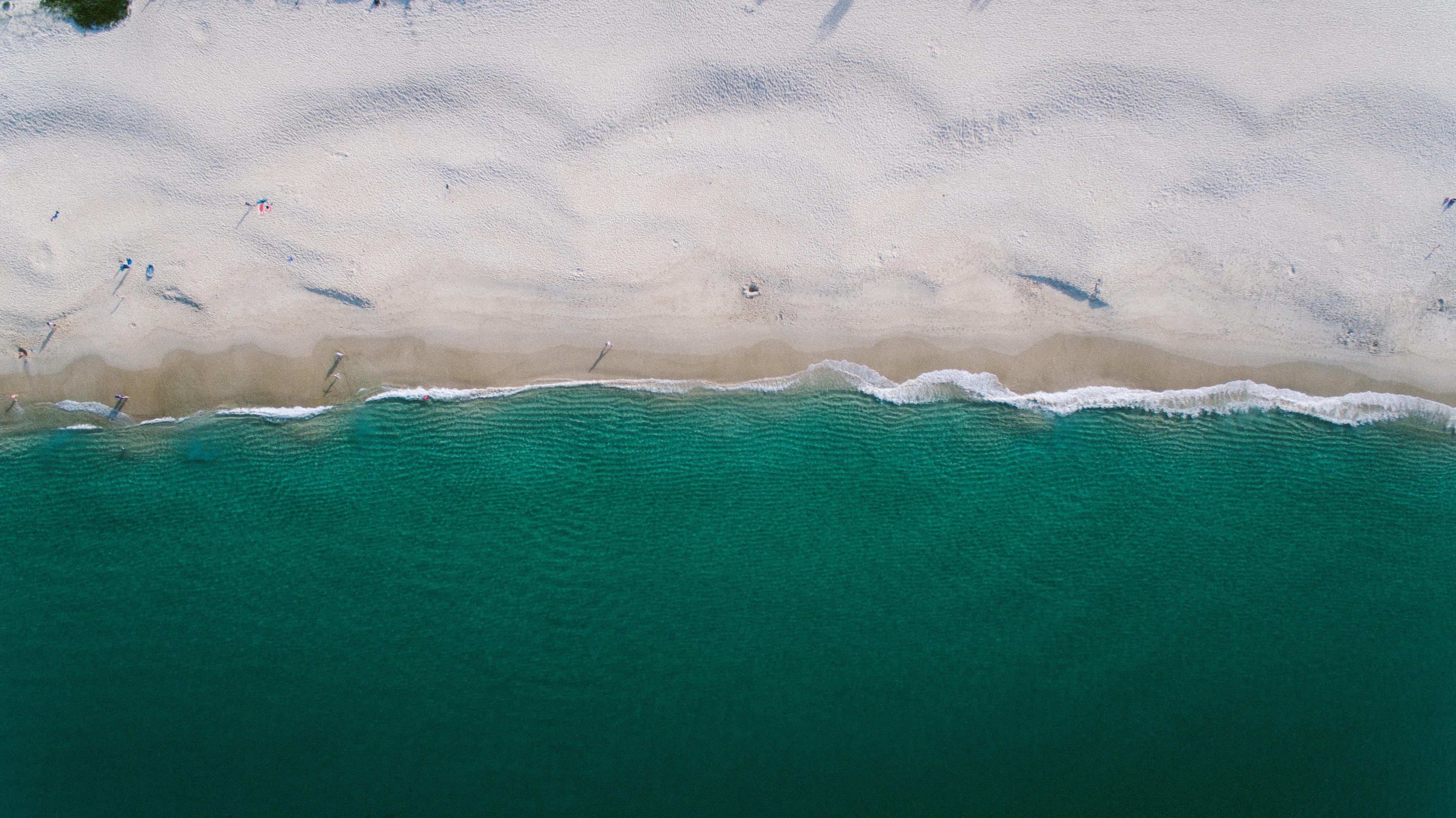 aerial photo of sea side with white sands free image