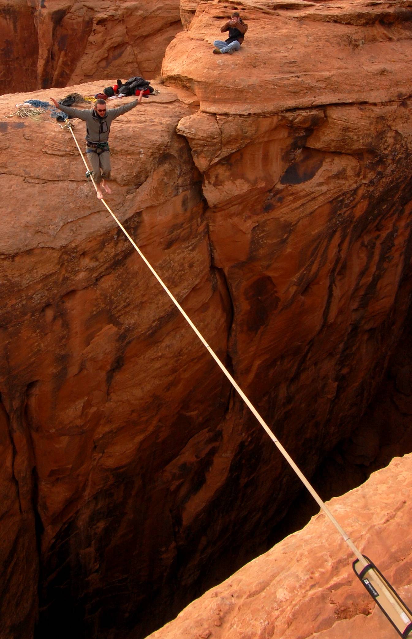 Me slacklining across the Birthday Gap in Arches National