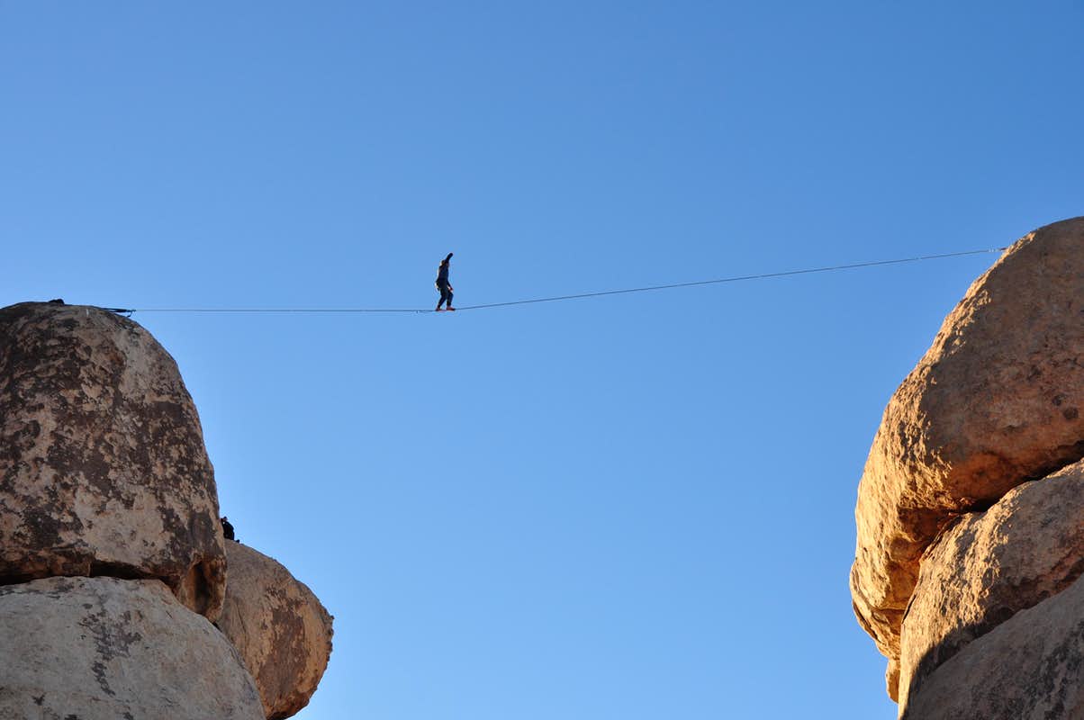 Walking a slackline between the North and South Horror Rocks